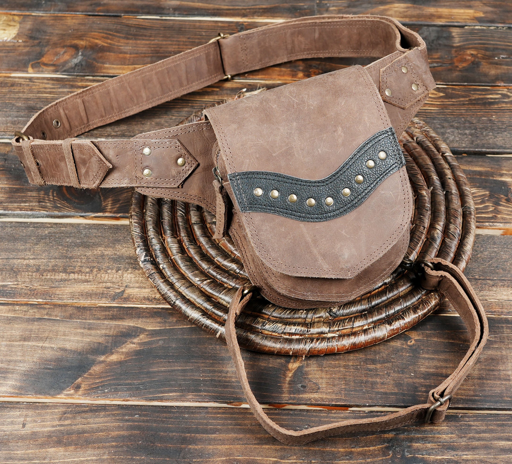 Discover the perfect blend of style and functionality with this Handmade Leather Waist & Thigh Belt.