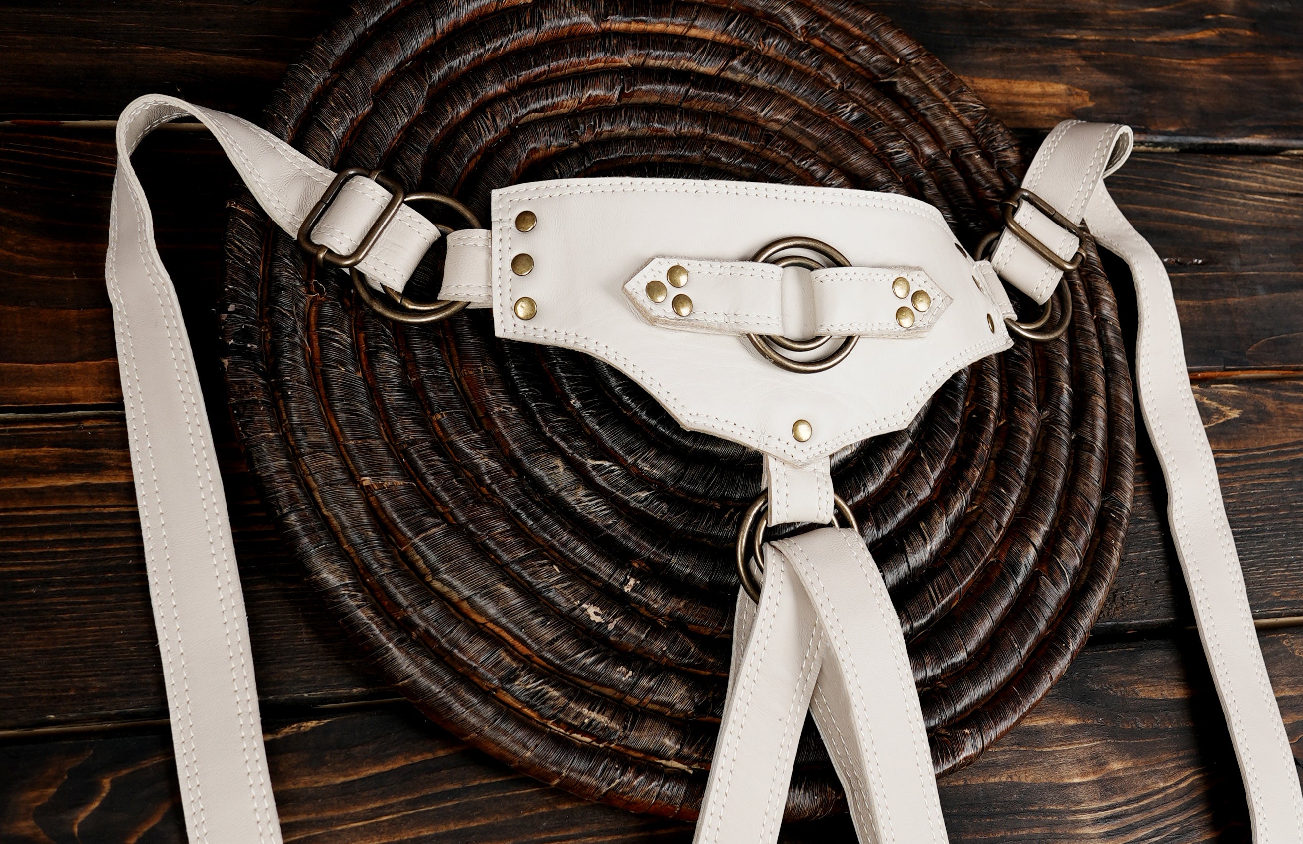 Handcrafted white leather holster with long fringe