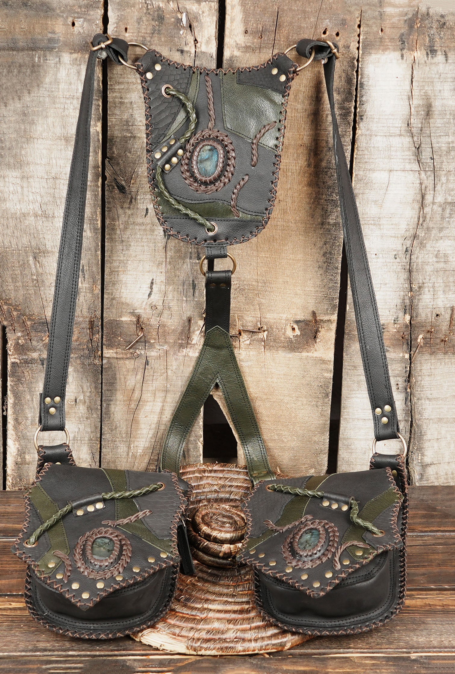 Handmade utility holster bag with adjustable straps and antique hardware.