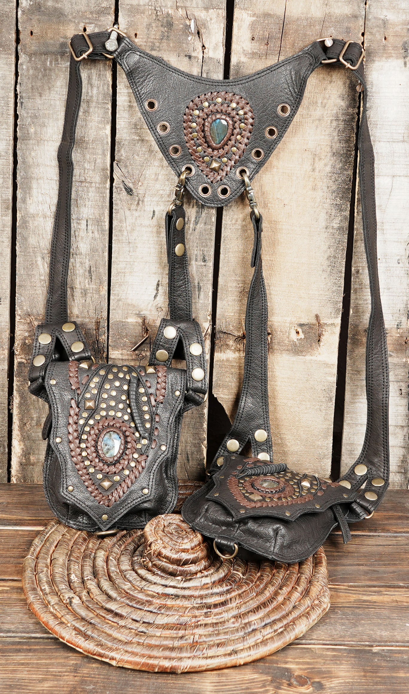 rafted from premium genuine leather, it features dual pouches with intricate studded designs and natural gemstone embellishments, making it a truly unique accessory.