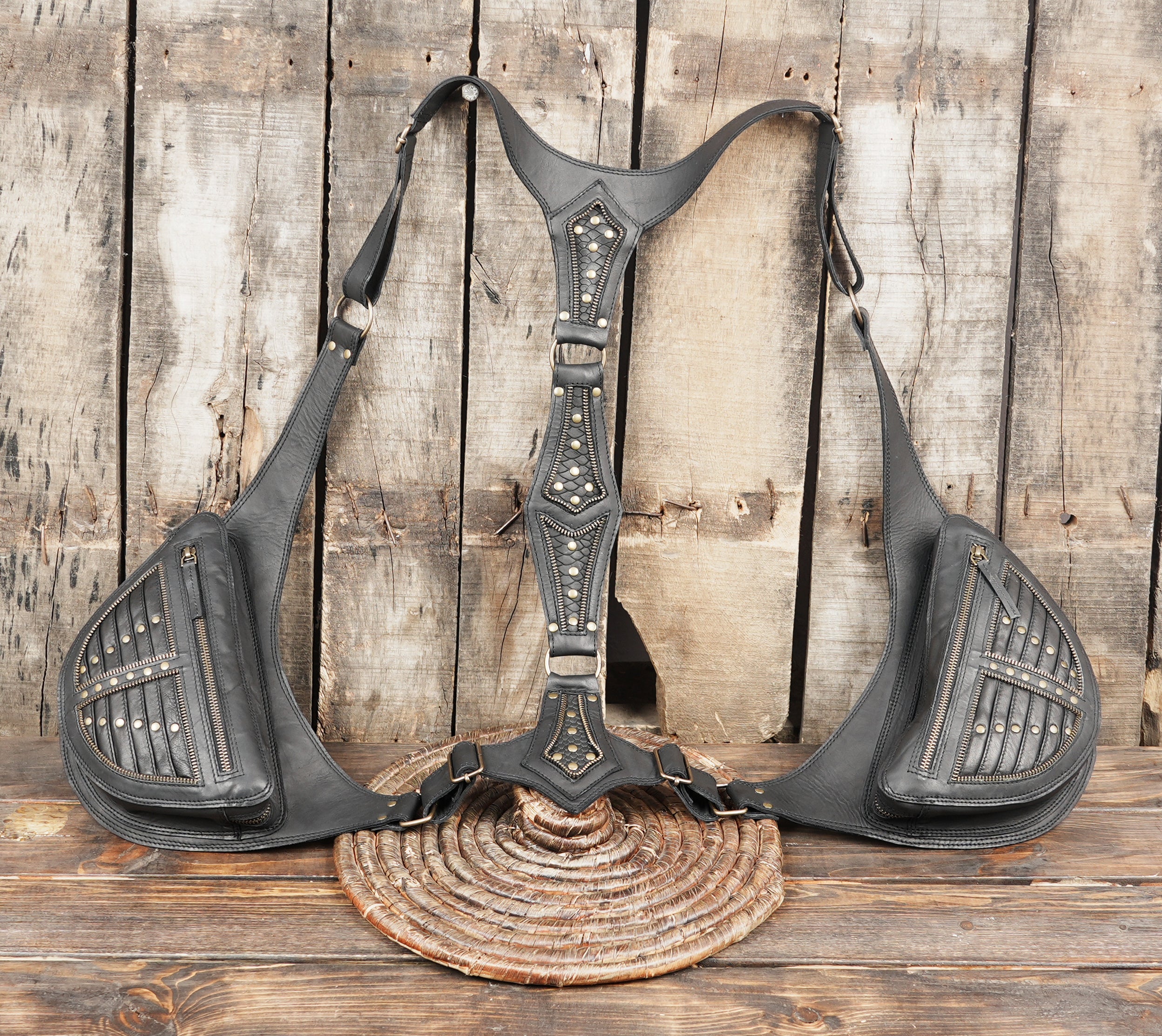 Black biker leather holster with twin pocket design and adjustable straps