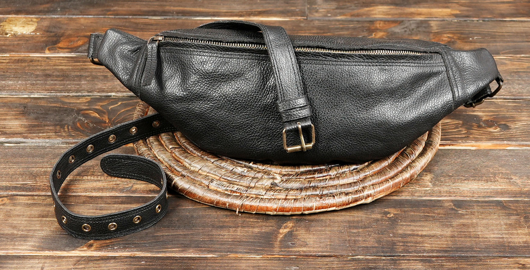 Luxury leather waist pouch in black for men and women