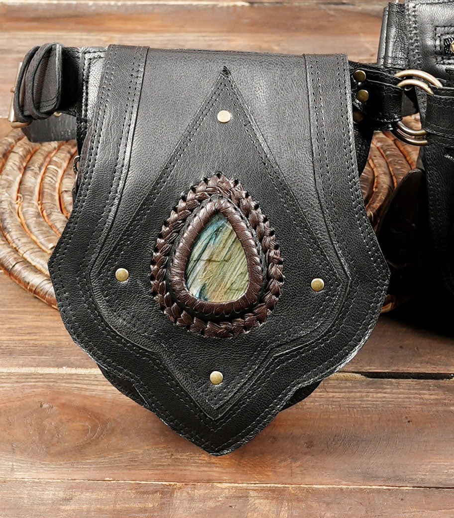 Black leather utility belt with double pockets and rustic metal details