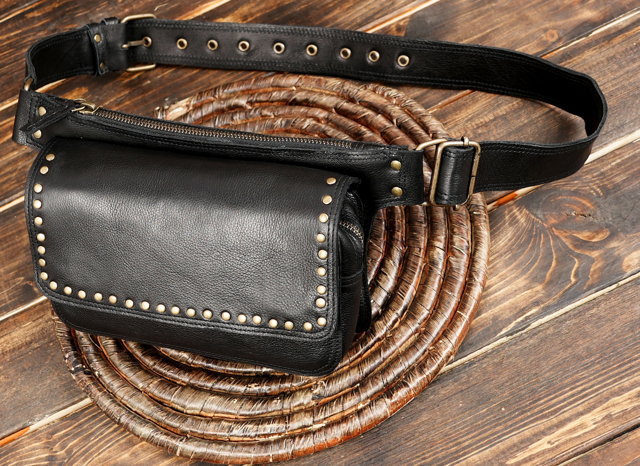 Durable handmade leather hip bag with stud detailing