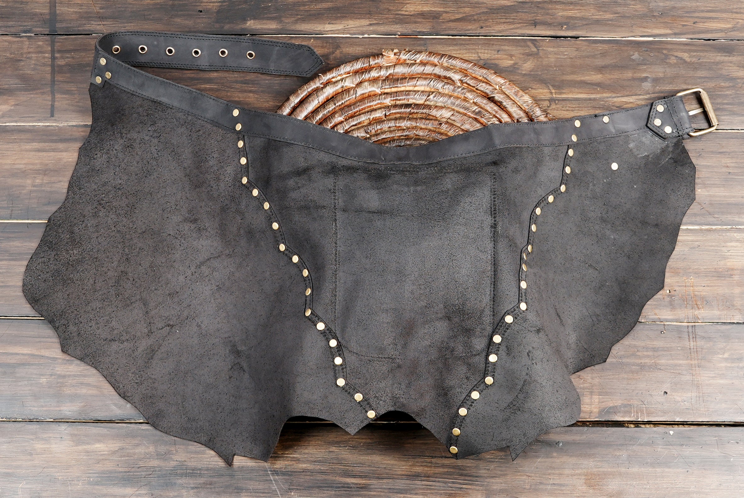 Adjustable waist belt with buckle and grommets for a comfortable custom fit