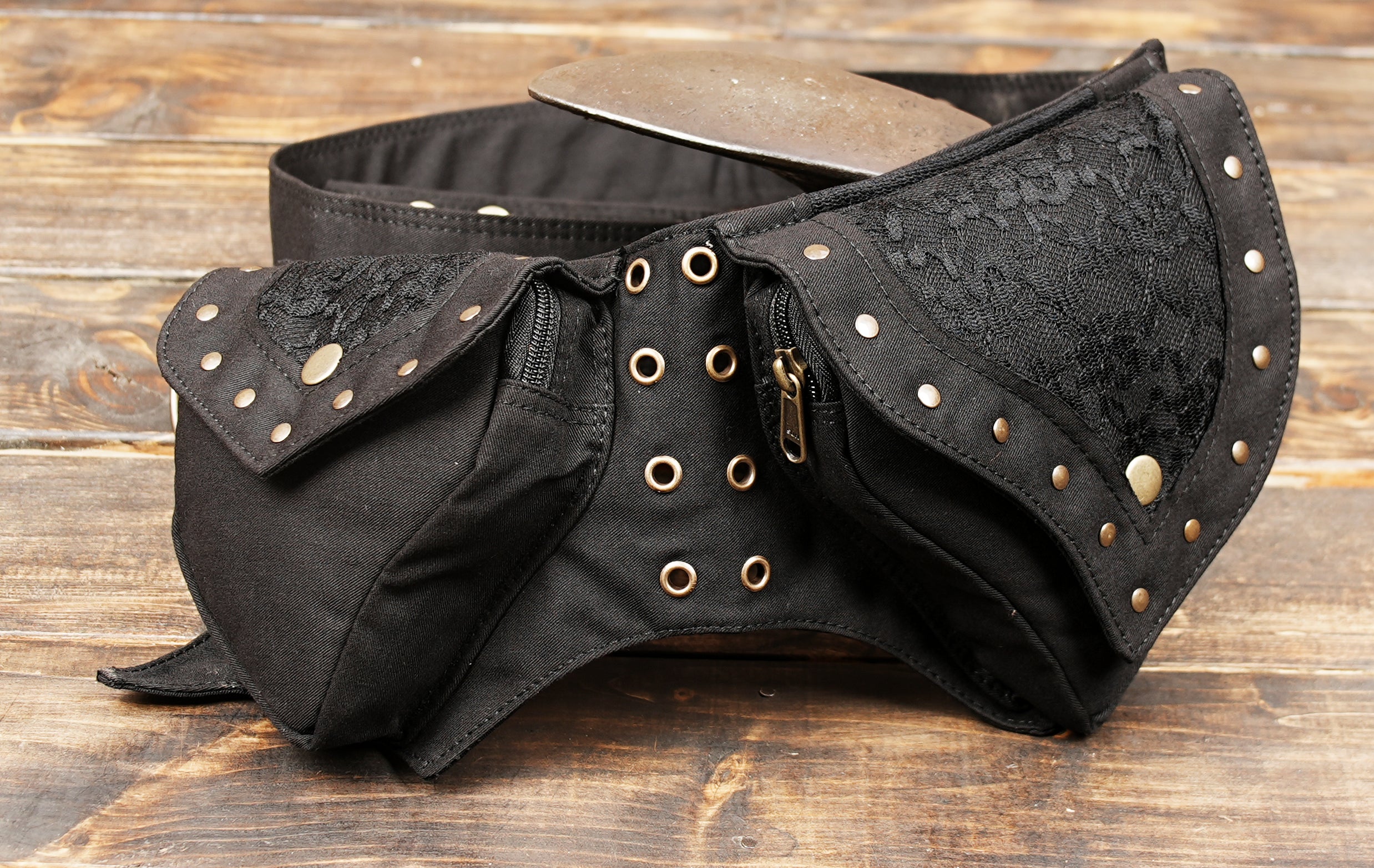 Black belt bag with two zippered pockets for secure storage