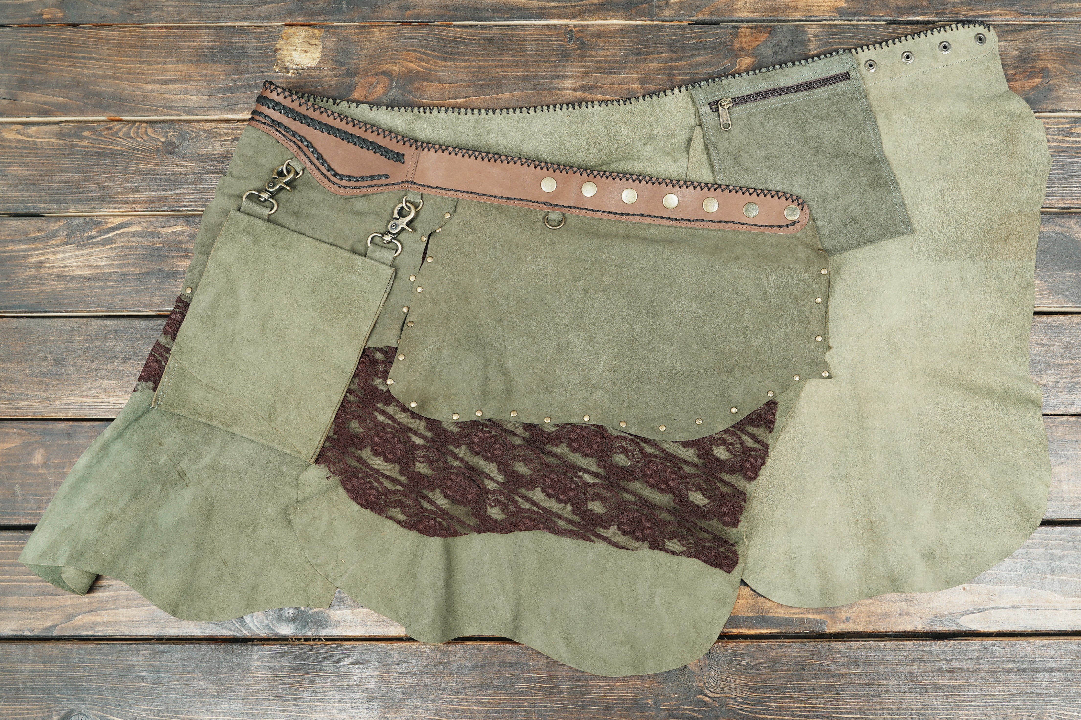 Steampunk-style leather skirt with metal studs