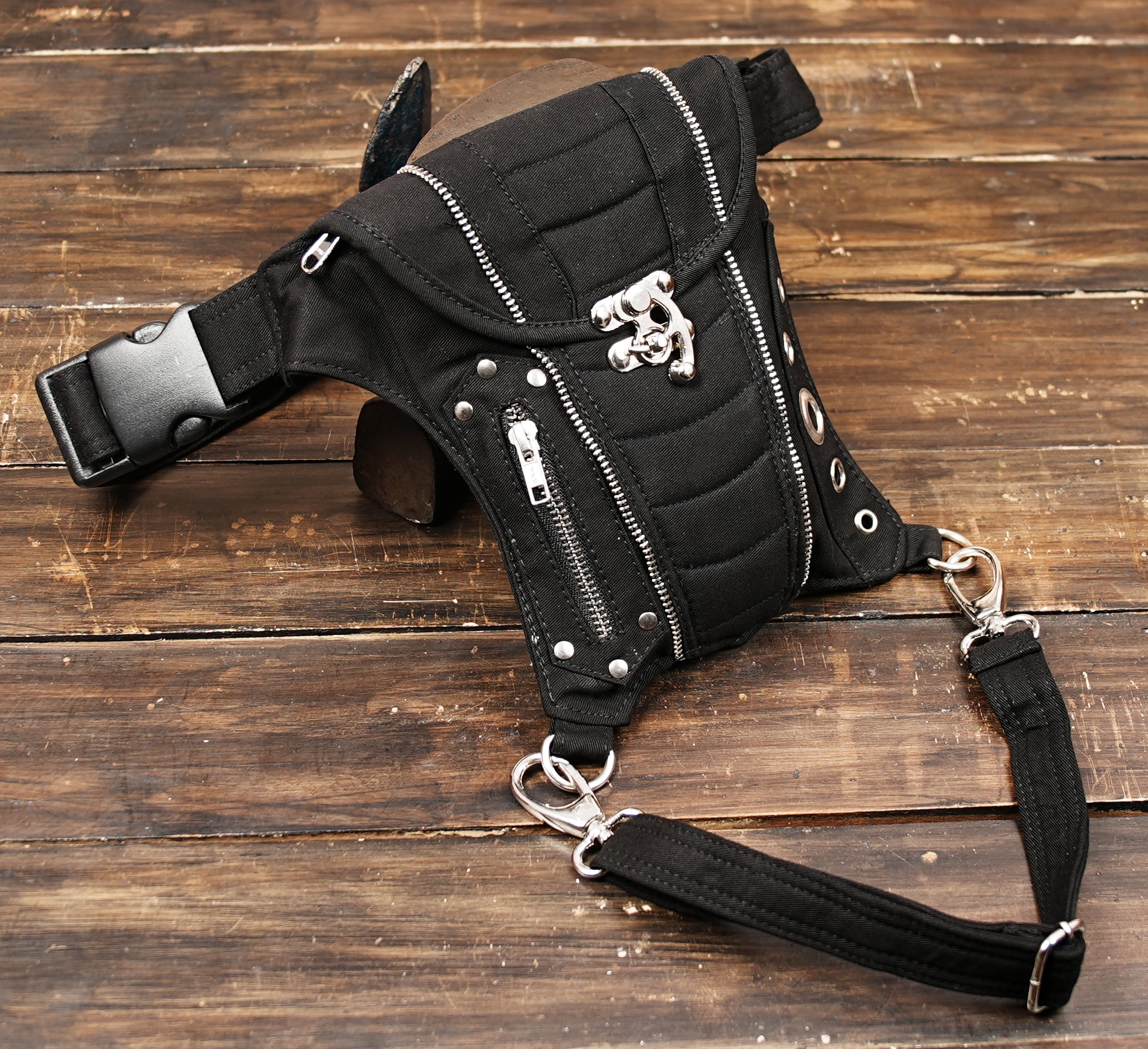 Front view of cotton waist pouch with buckle and zipper details