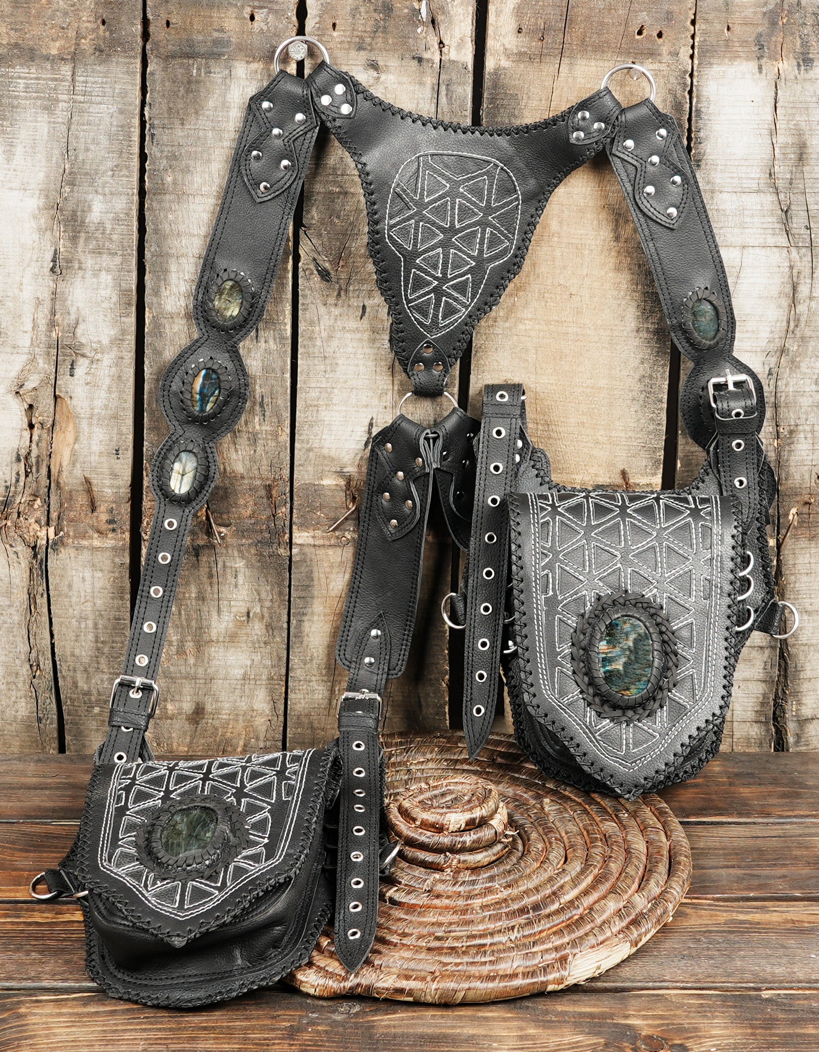 Festival style dual pocket leather harness with ornate stitching and hardware