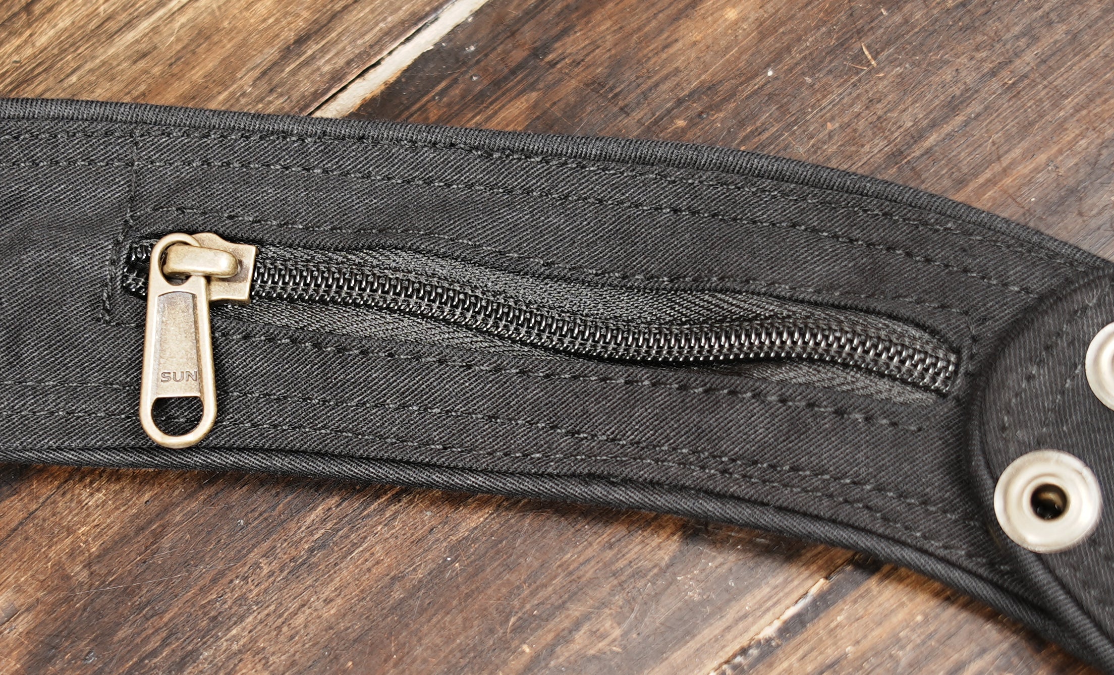 Cotton holster bag open with wallet, phone, and cards inside