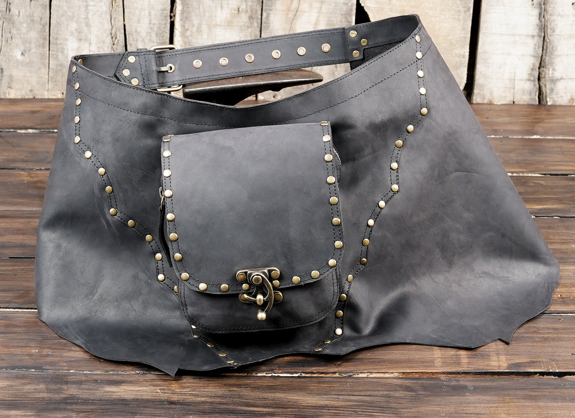 Adjustable waist belt with buckle and grommets for a comfortable custom fit