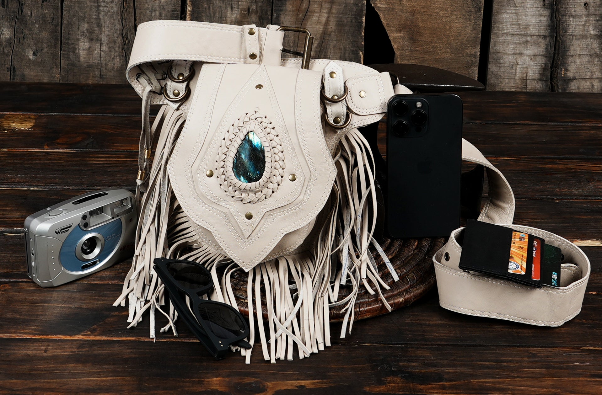 Steampunk-inspired belt pouch with gemstone and fringe