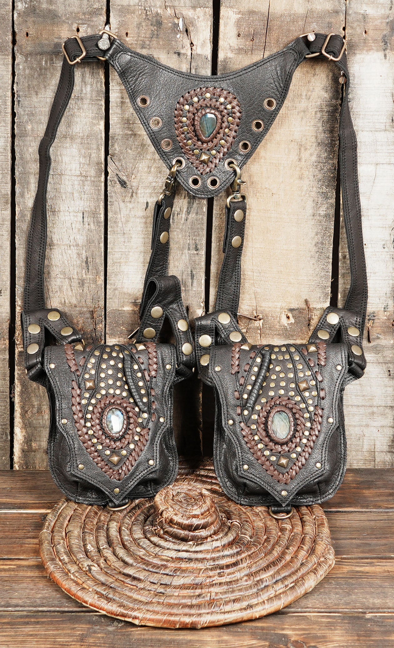 The adjustable straps provide a comfortable fit, while the spacious pouches allow you to carry essentials such as your phone, wallet, and keys with ease.