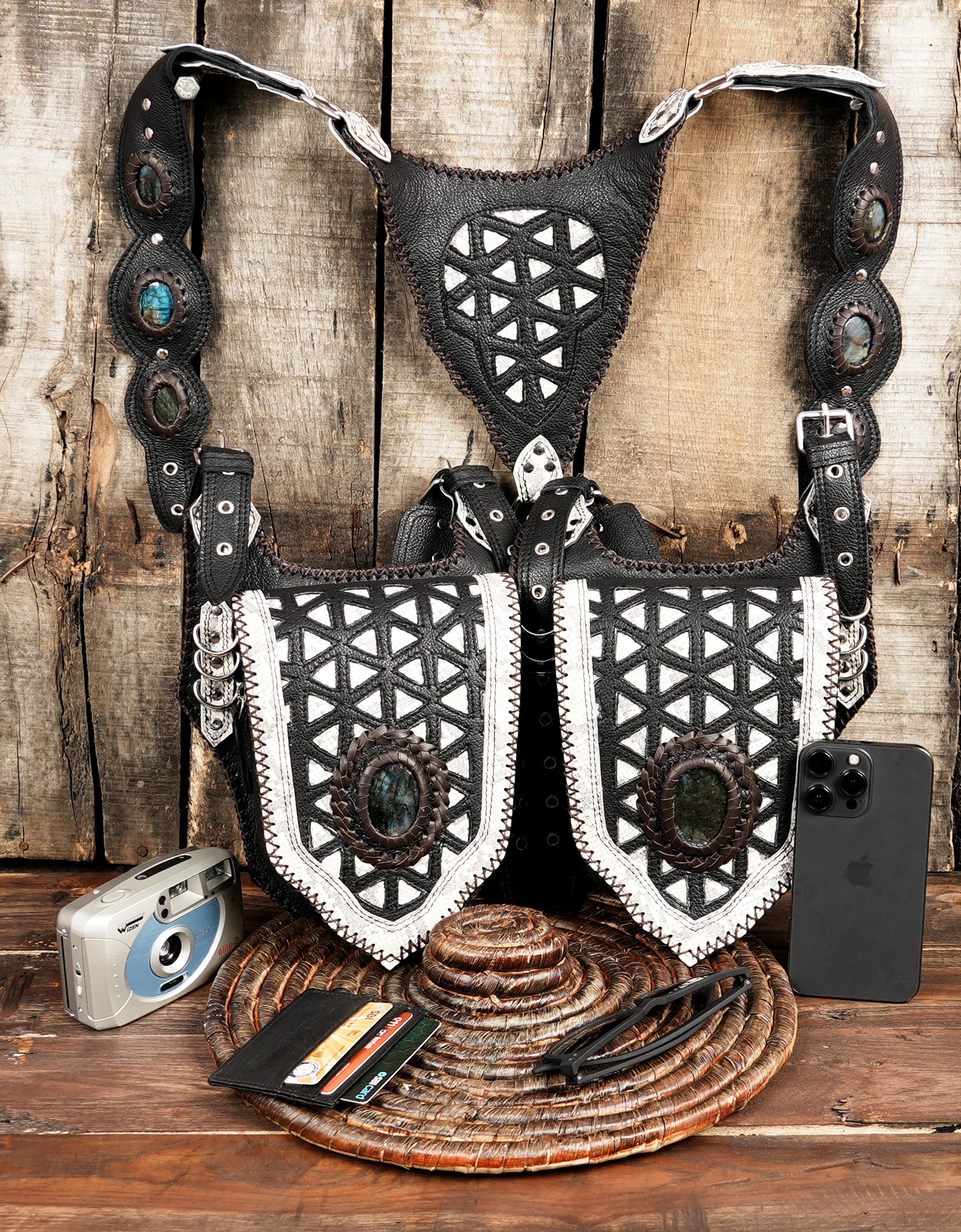 Premium handmade leather holster bag on vintage wooden surface