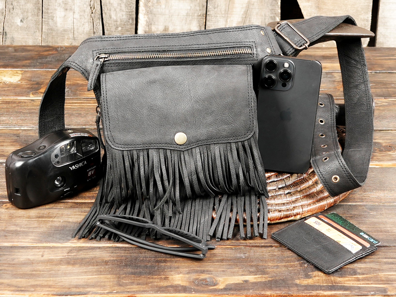 Black fringe hip pouch for women with adjustable strap and front pocket