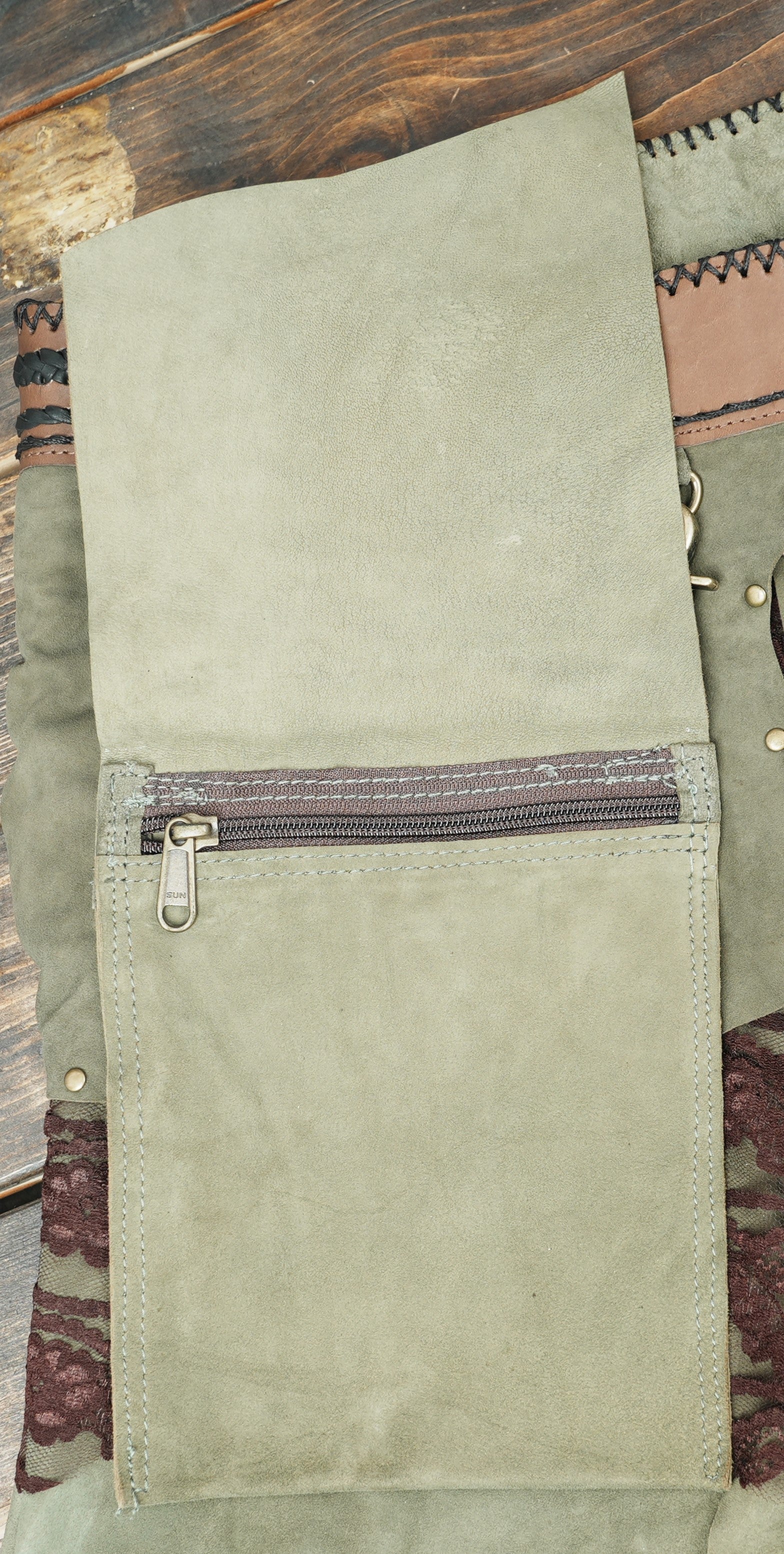 Artisan leather skirt with decorative brown waistband