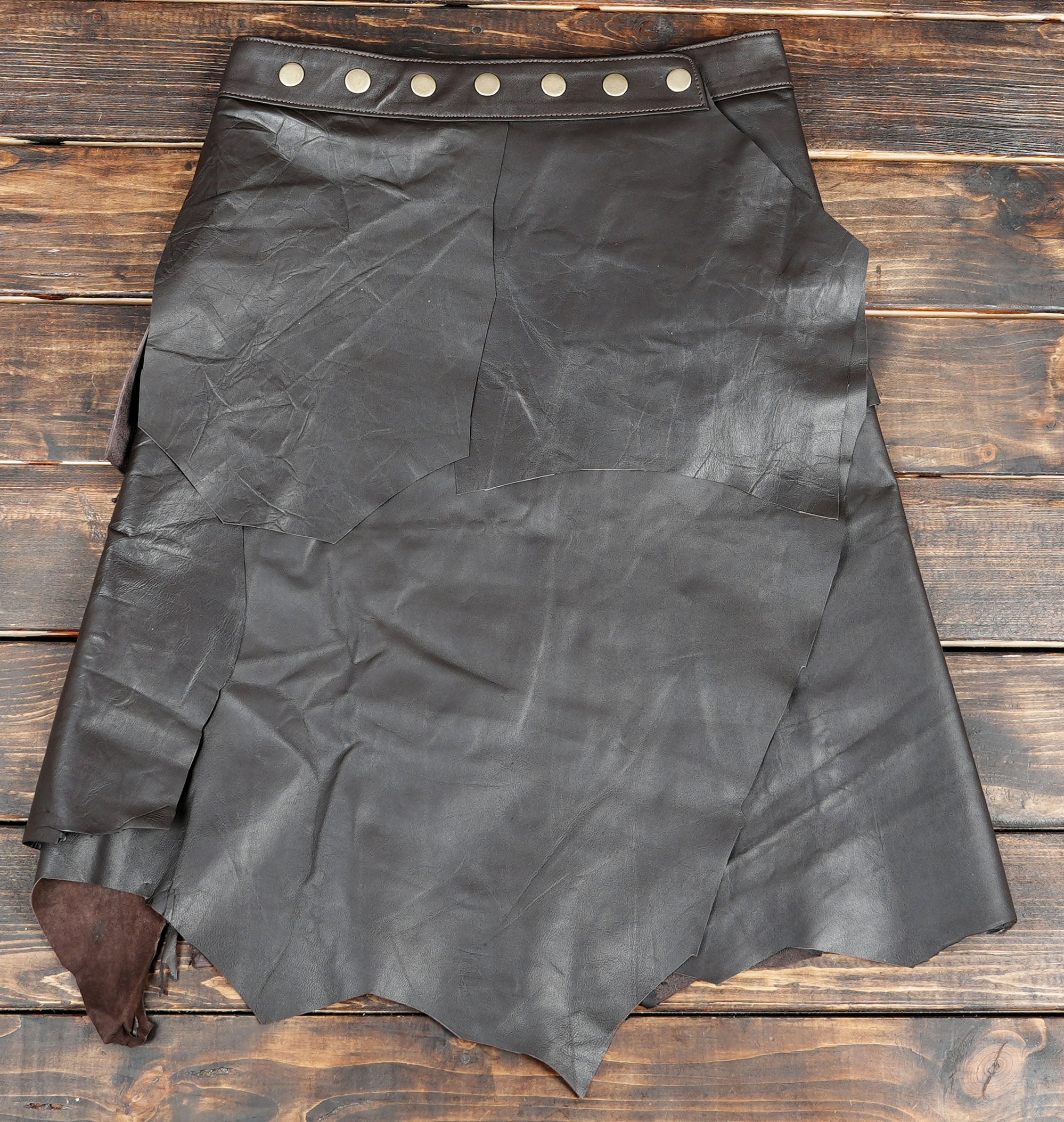 Handmade leather skirt crafted from genuine hides, giving each piece a one-of-a-kind finish