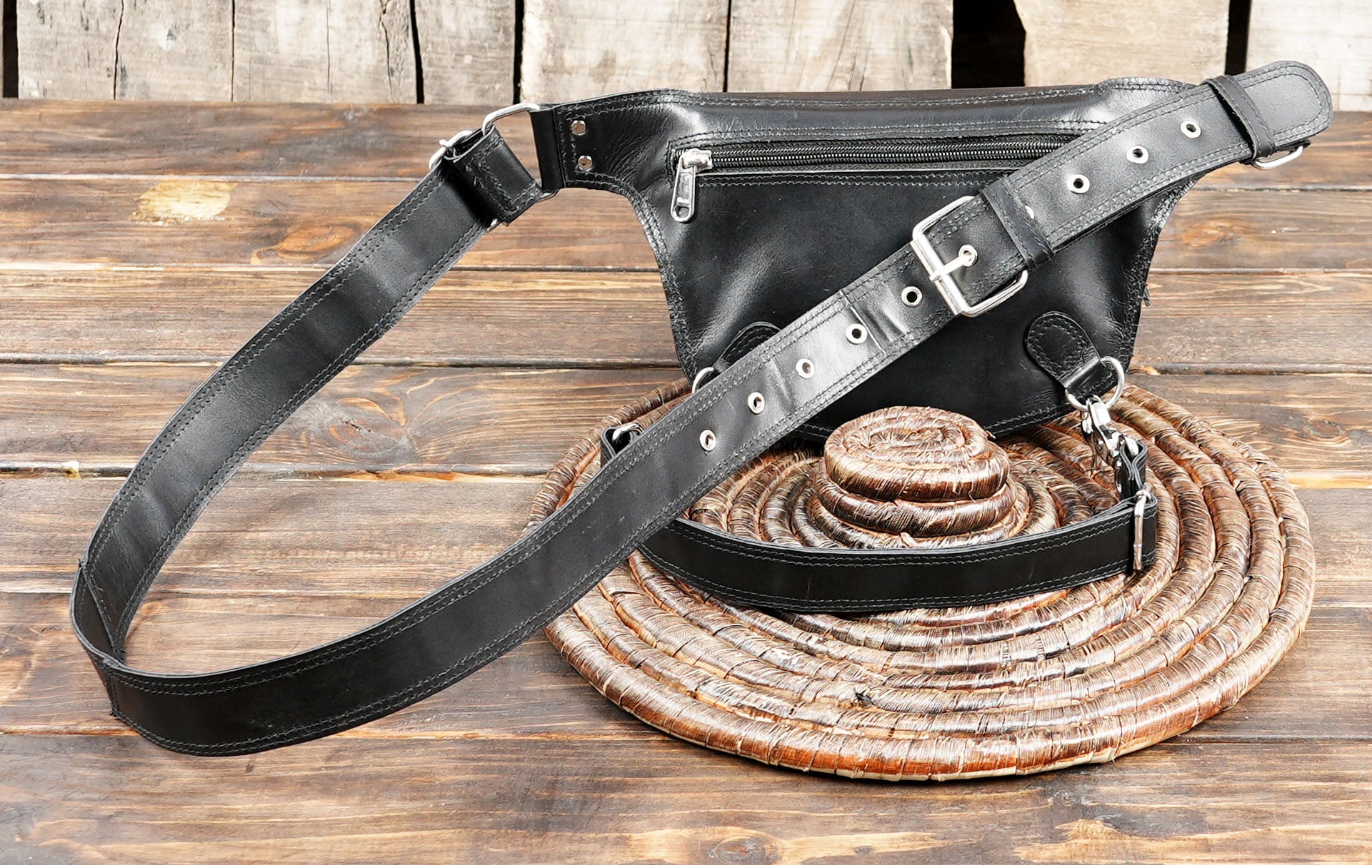 Gothic-style leather hip bag with dual compartments for travel essentials