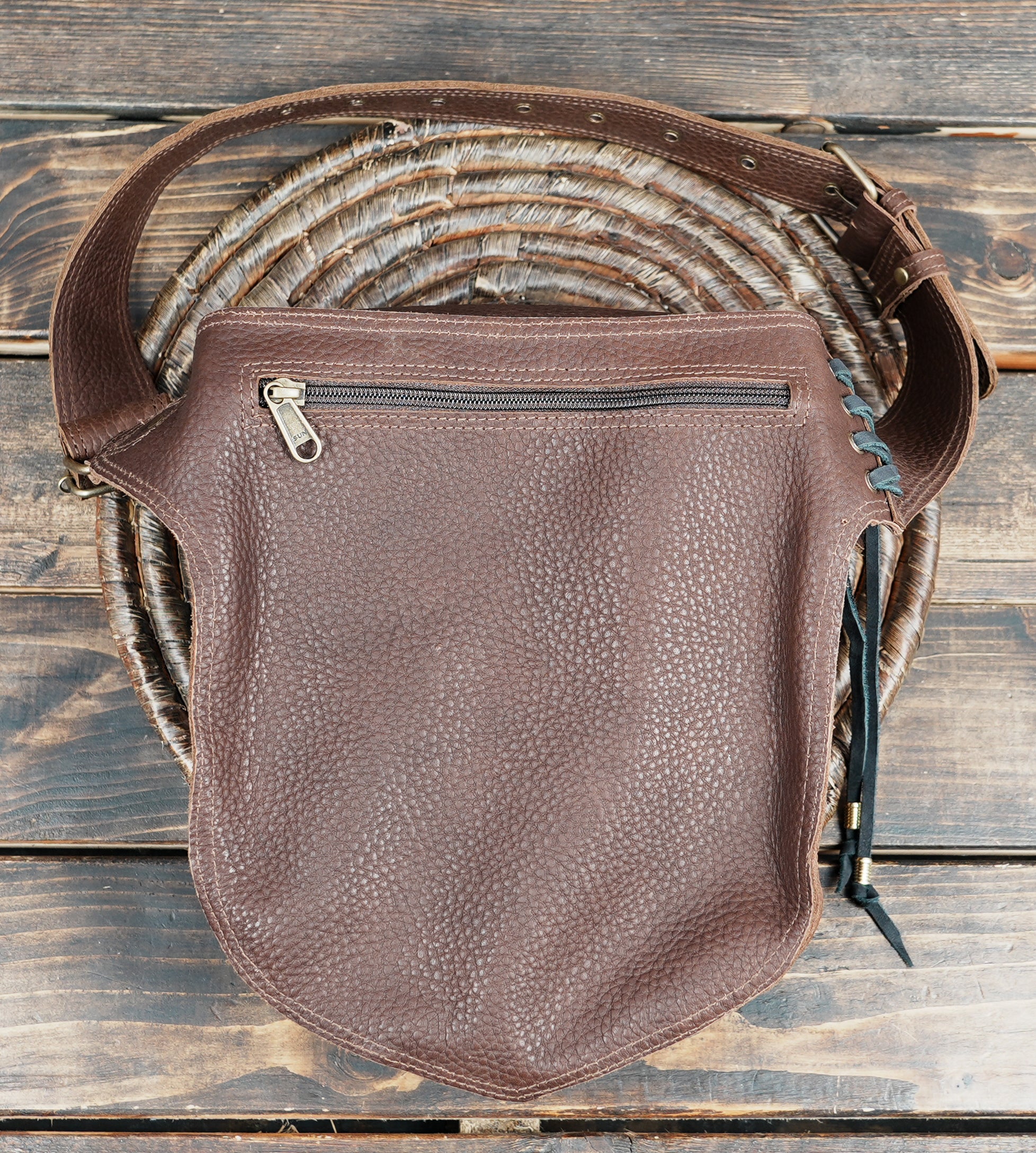 Medieval or cosplay leather belt pouch with gemstone centerpiece and gold rivets