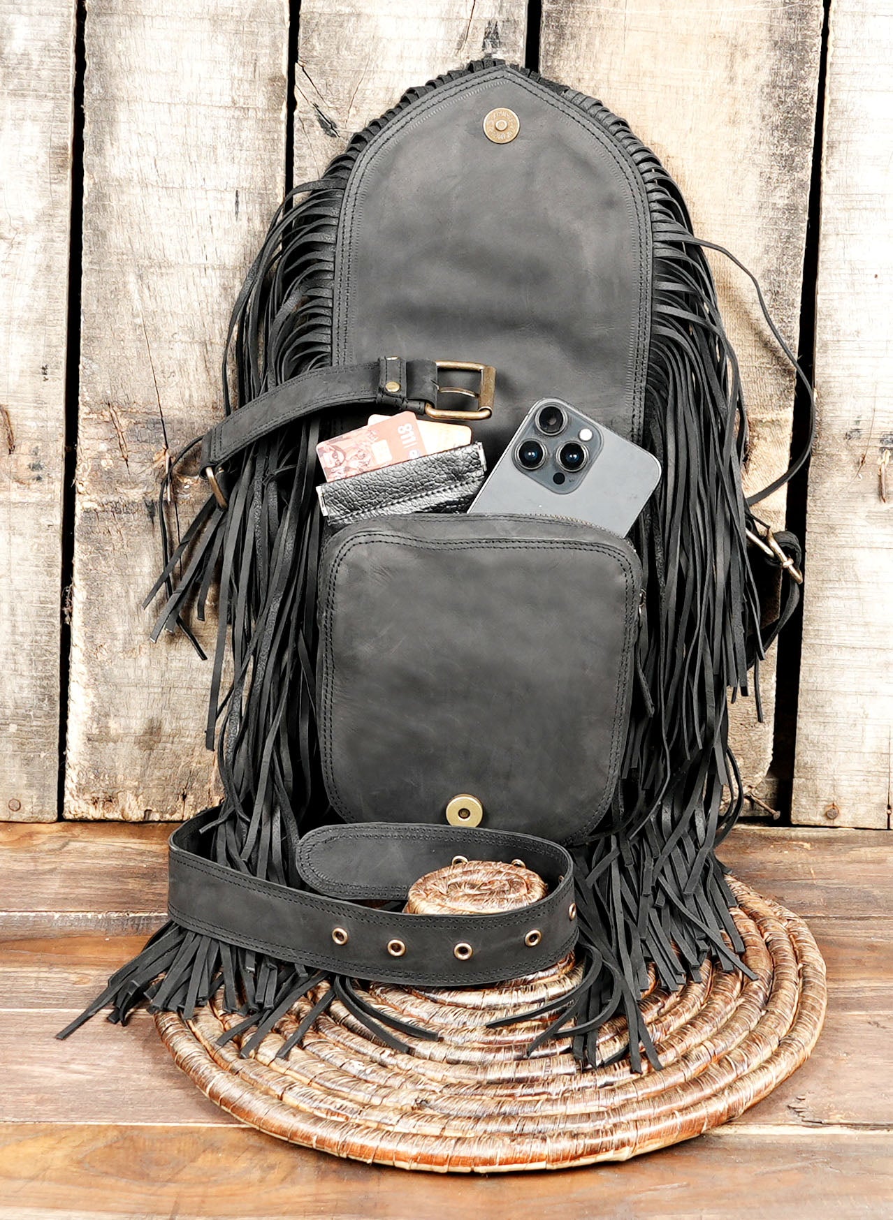 Black fringe bag with unique handcrafted snake motif