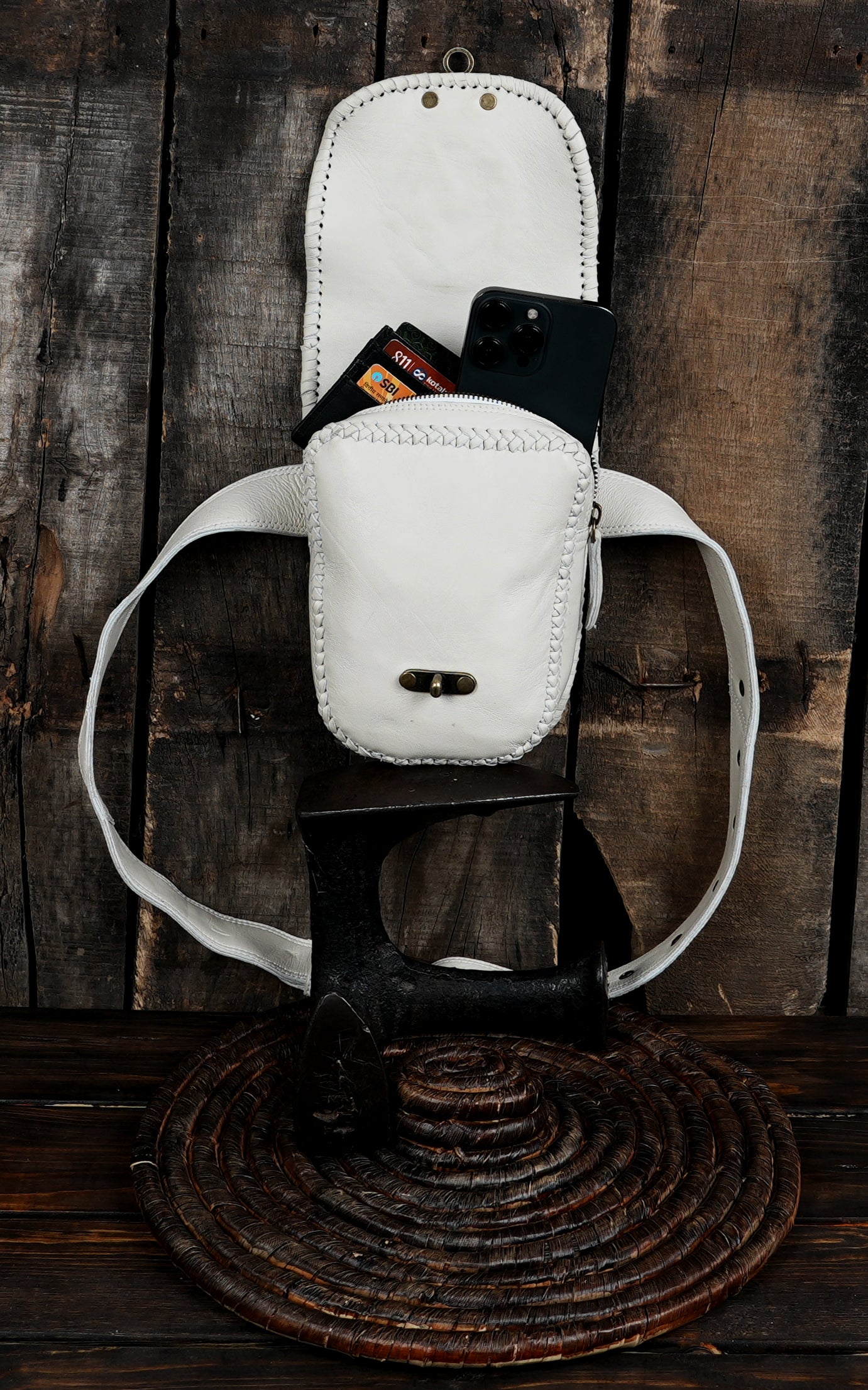 Artisan leather waist pack with gemstone inlay and antique closure