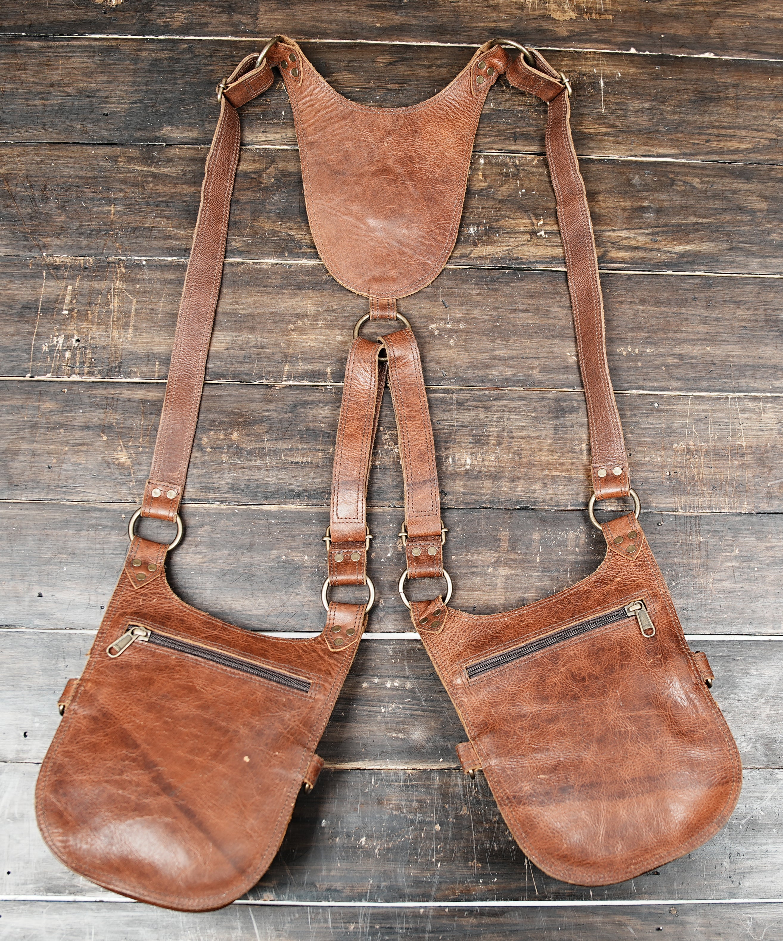 Detailed shot of hand-stitched leather holster bag with natural gemstone