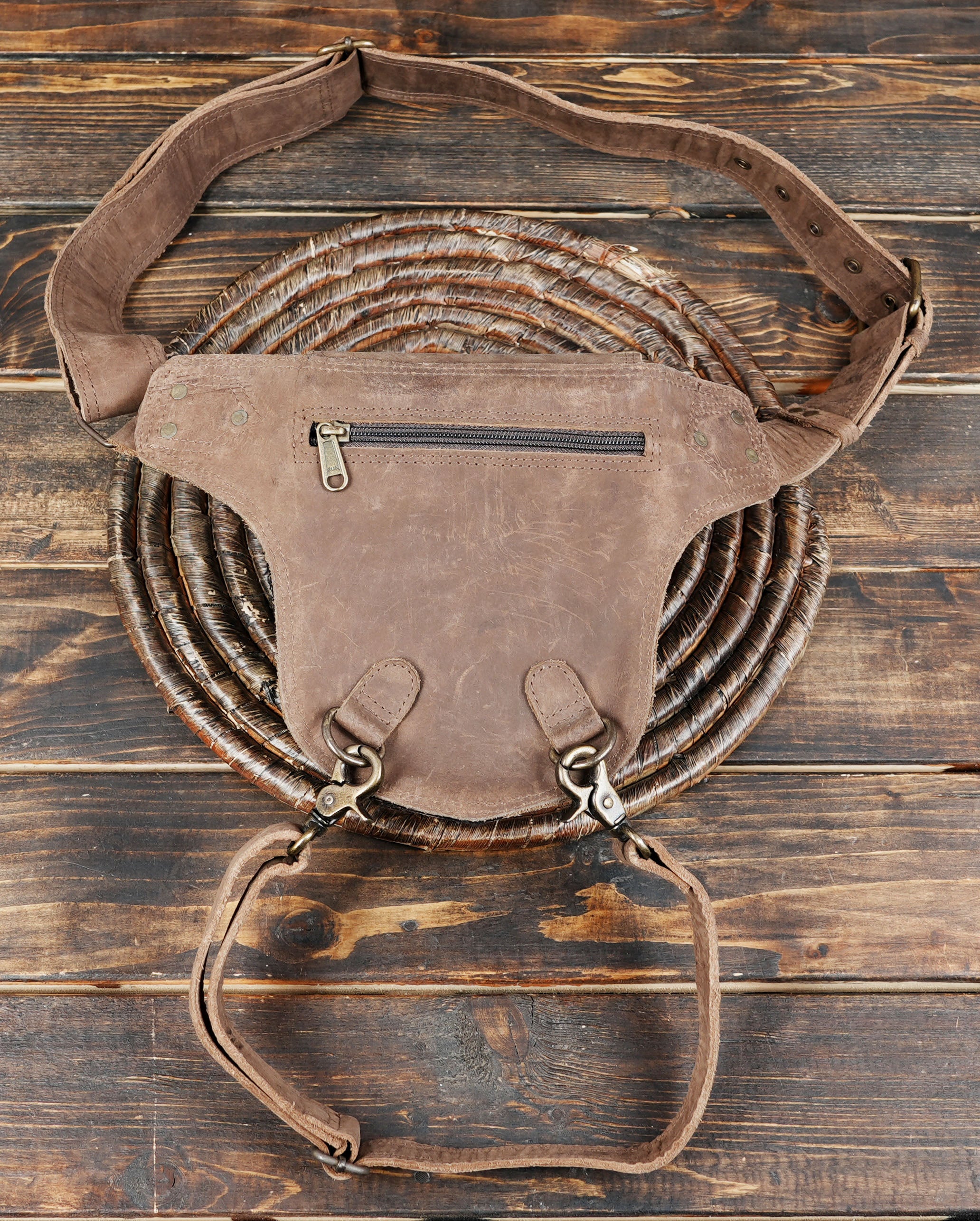 this leather thigh holster adds a bold statement to your outfit. Lightweight yet durable, it is built to last and ensures hands-free convenience wherever you go.