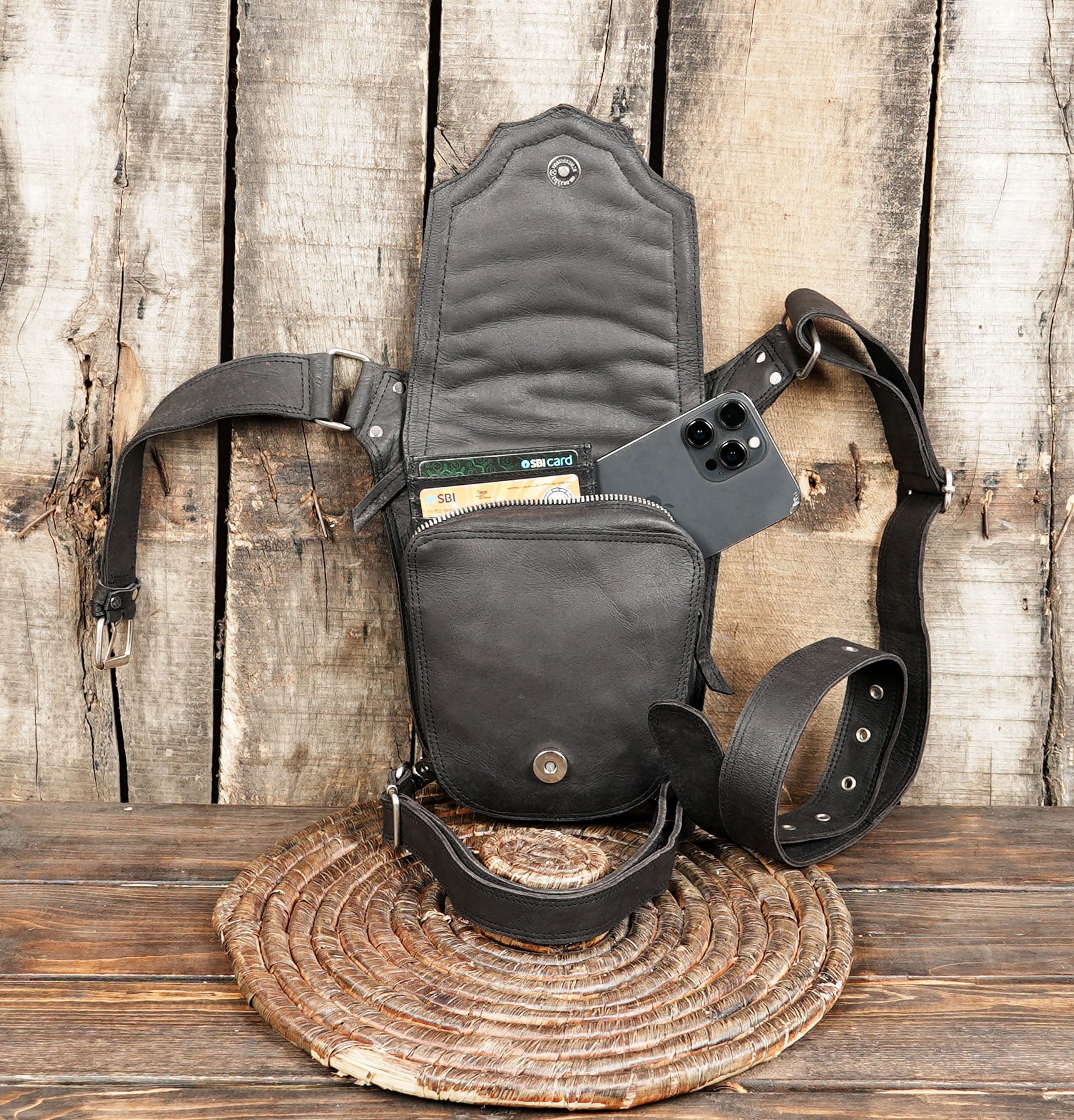 Handmade biker thigh belt bag crafted from genuine black leather.