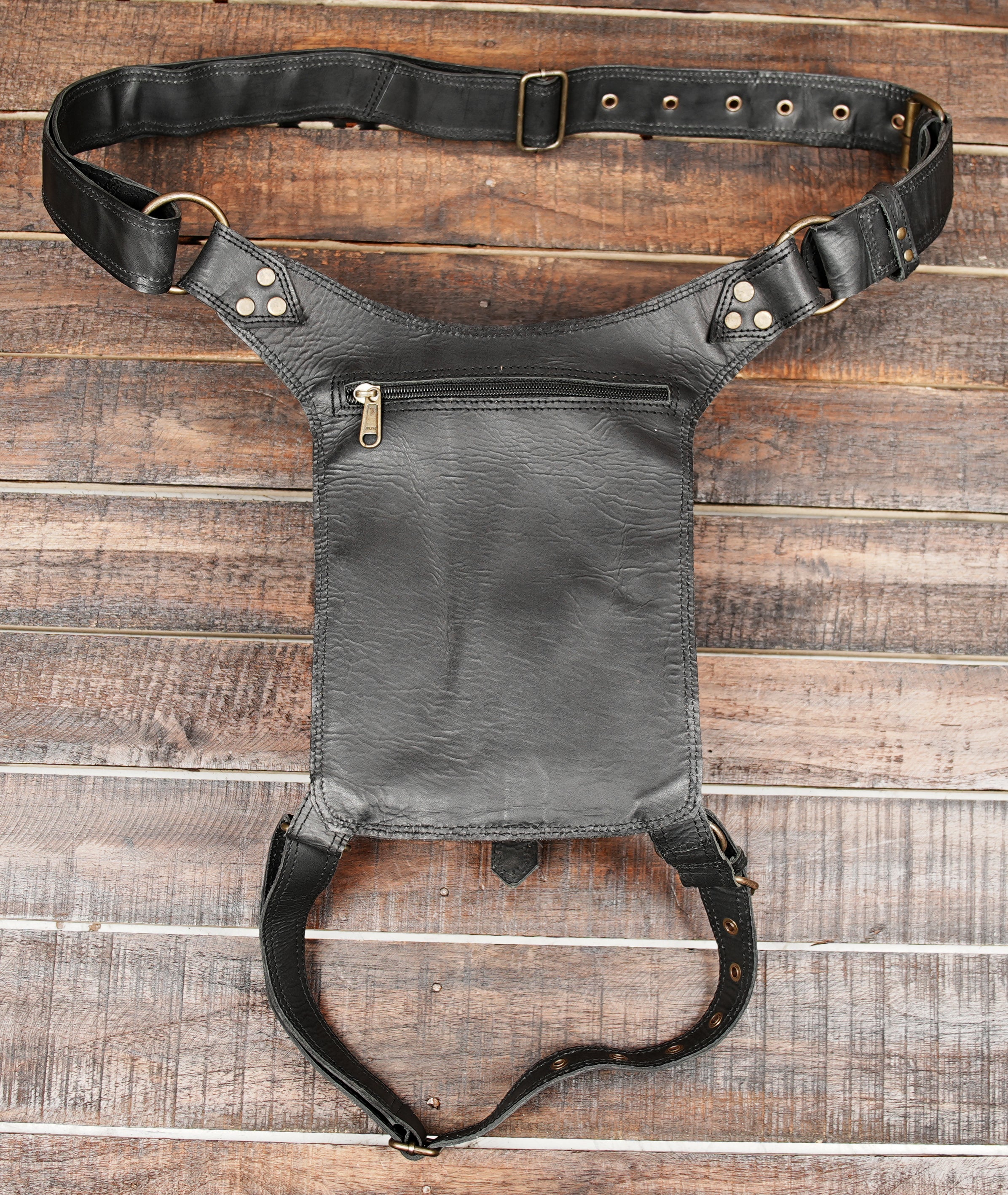 Designed with adjustable waist and thigh straps, it ensures a secure and comfortable fit while keeping your essentials within easy reach.