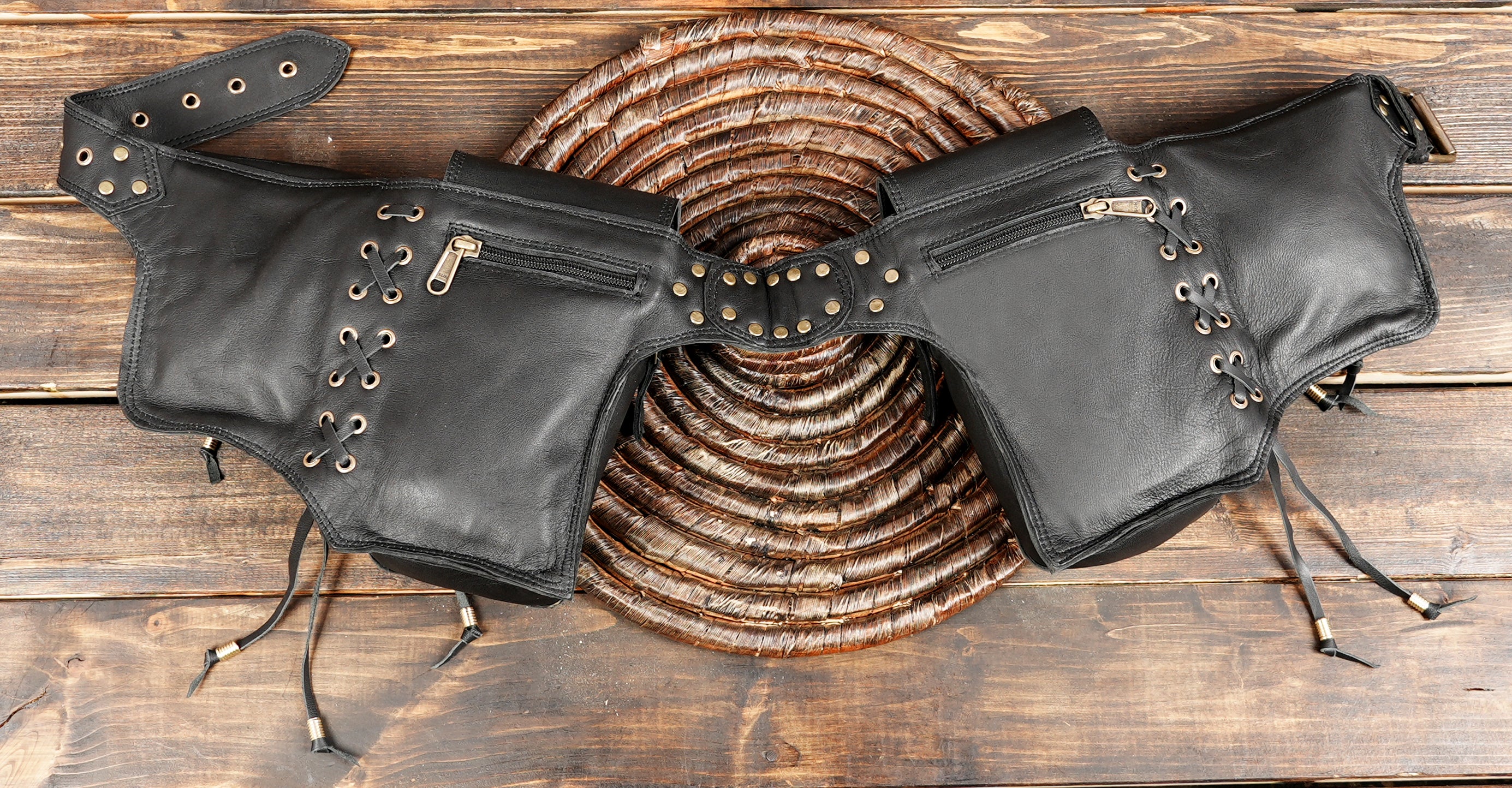 Artisan-made black leather belt bag with adjustable buckle