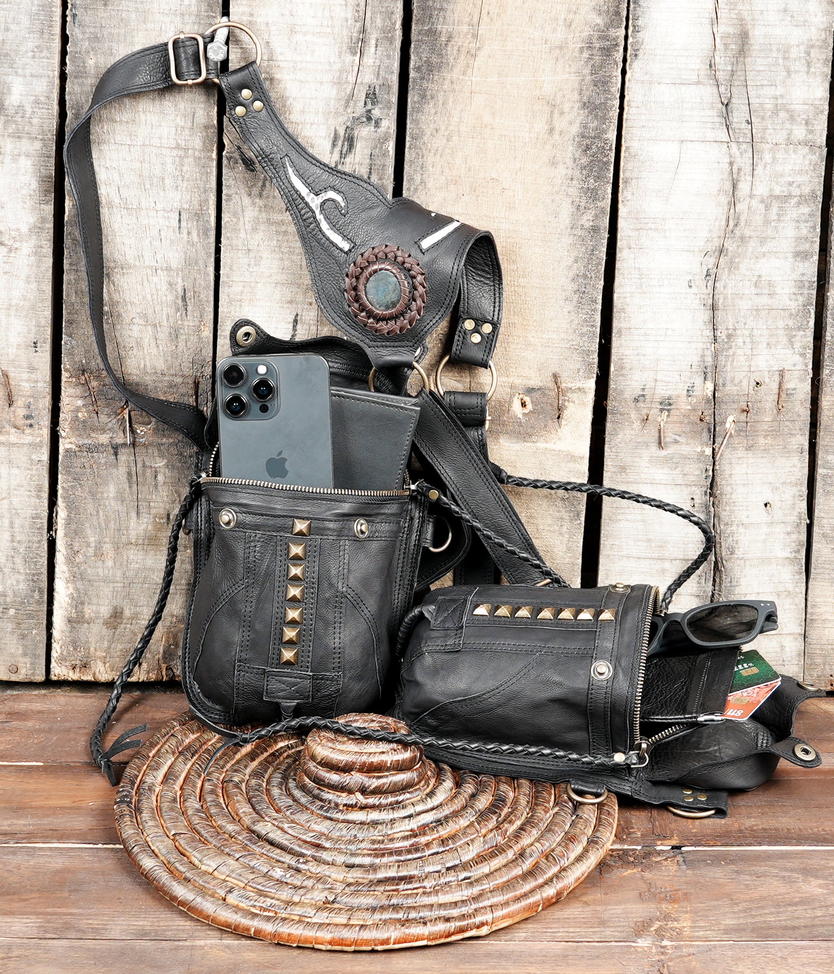Open view of leather festival holster bag showing phone and wallet compartments