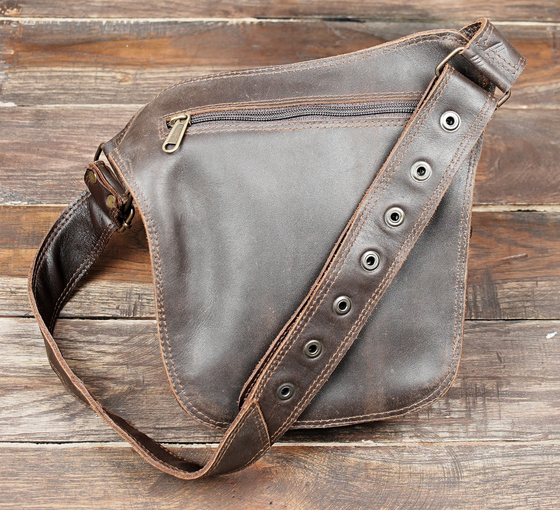 Leather hip pouch with gemstone design on adjustable belt