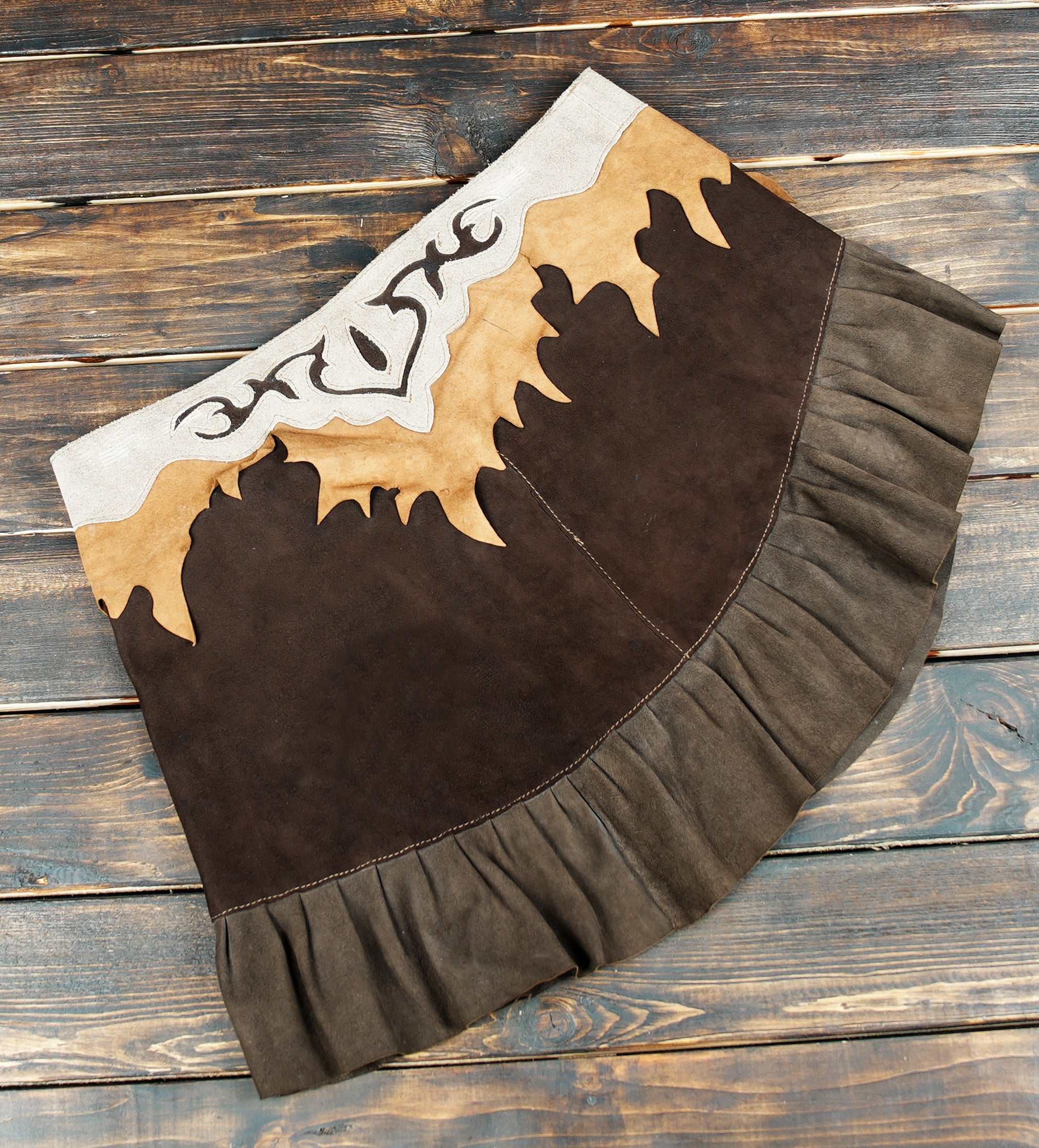 Handcrafted suede leather skirt with soft texture and artisan detailing