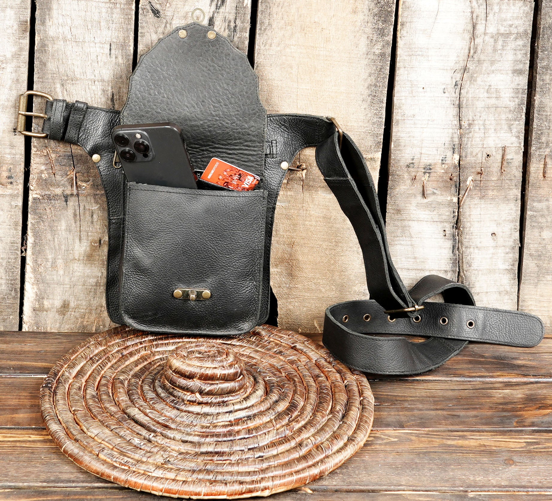 Functional black waist belt bag with front flap and brass locking clasp