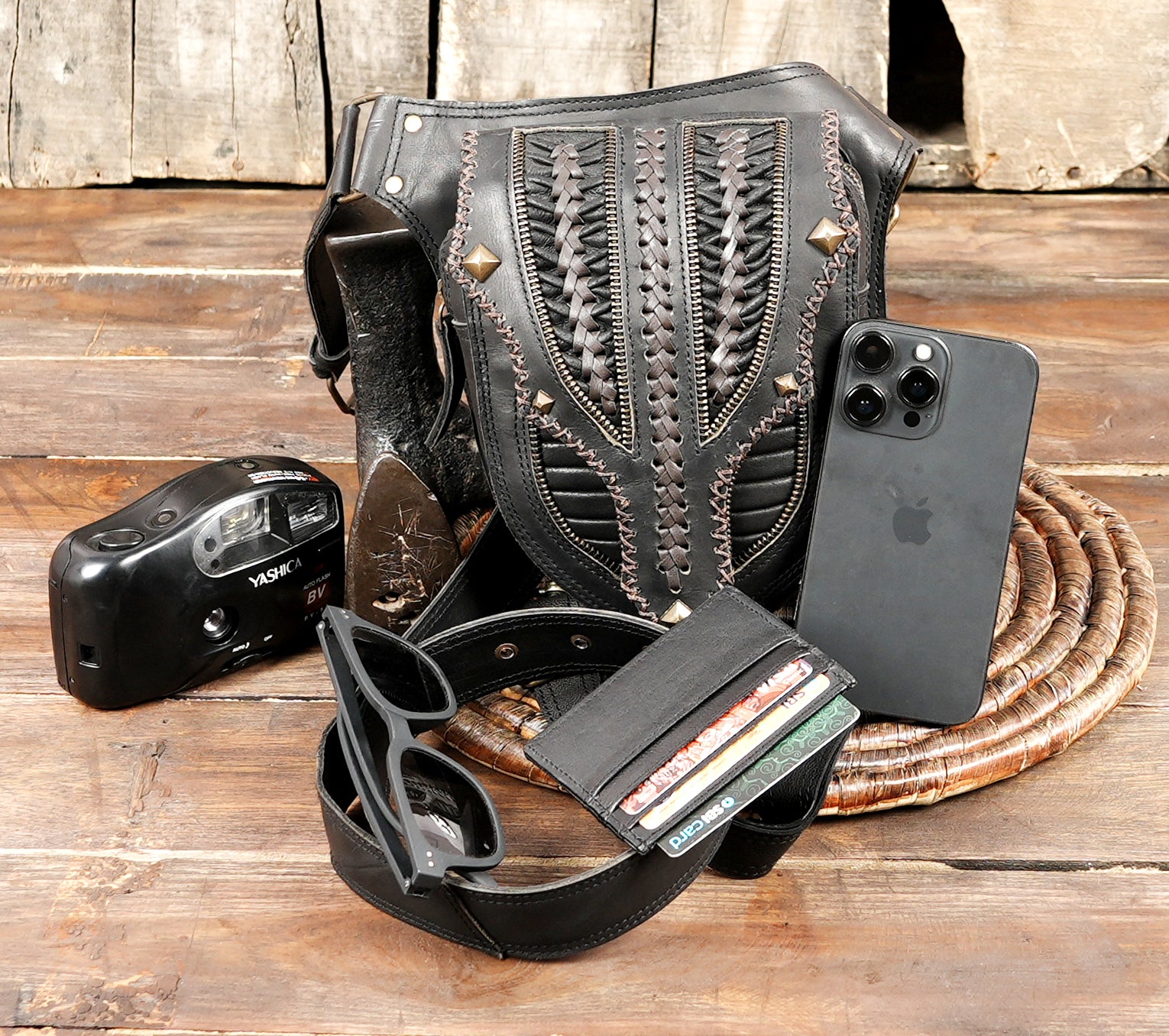 Stylish black leather hip pack with zipper compartments