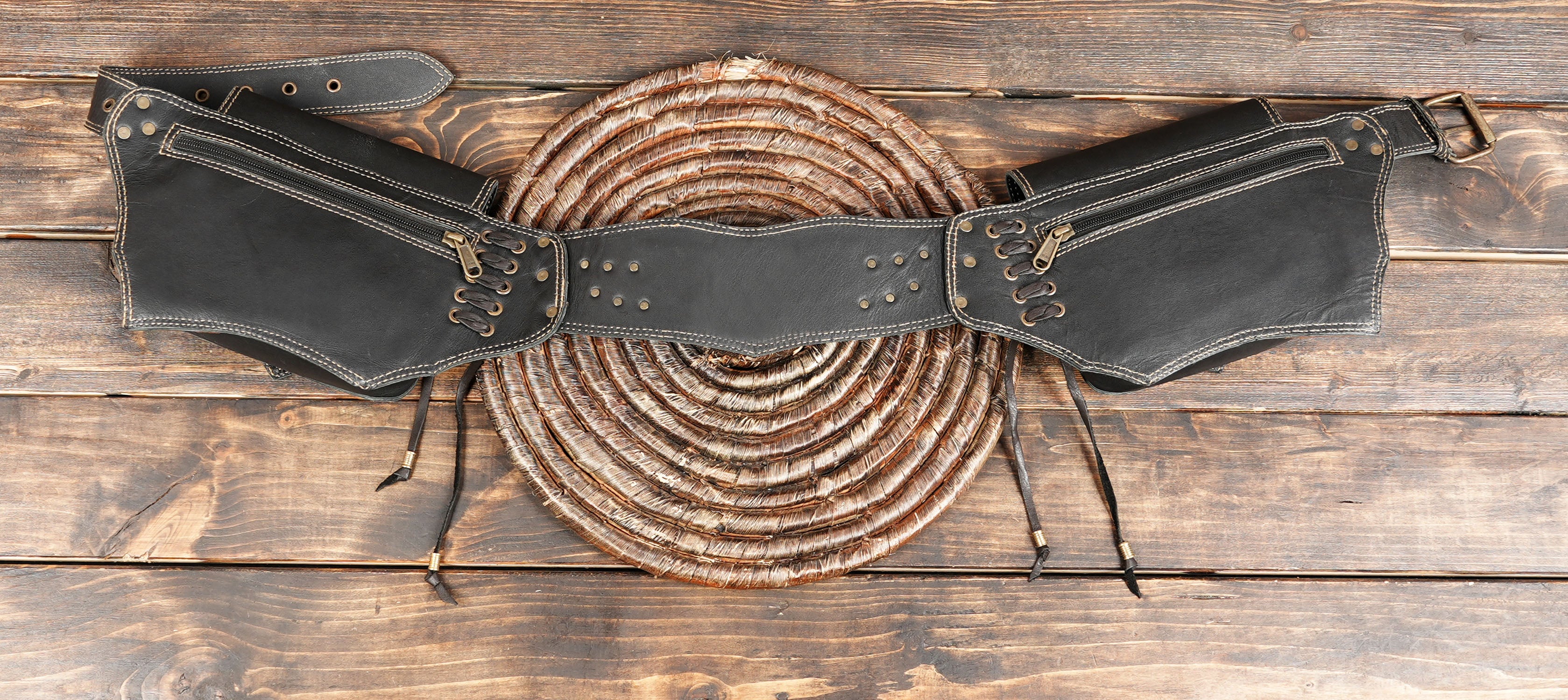 Rustic bohemian leather belt pouch with dual pockets and studs