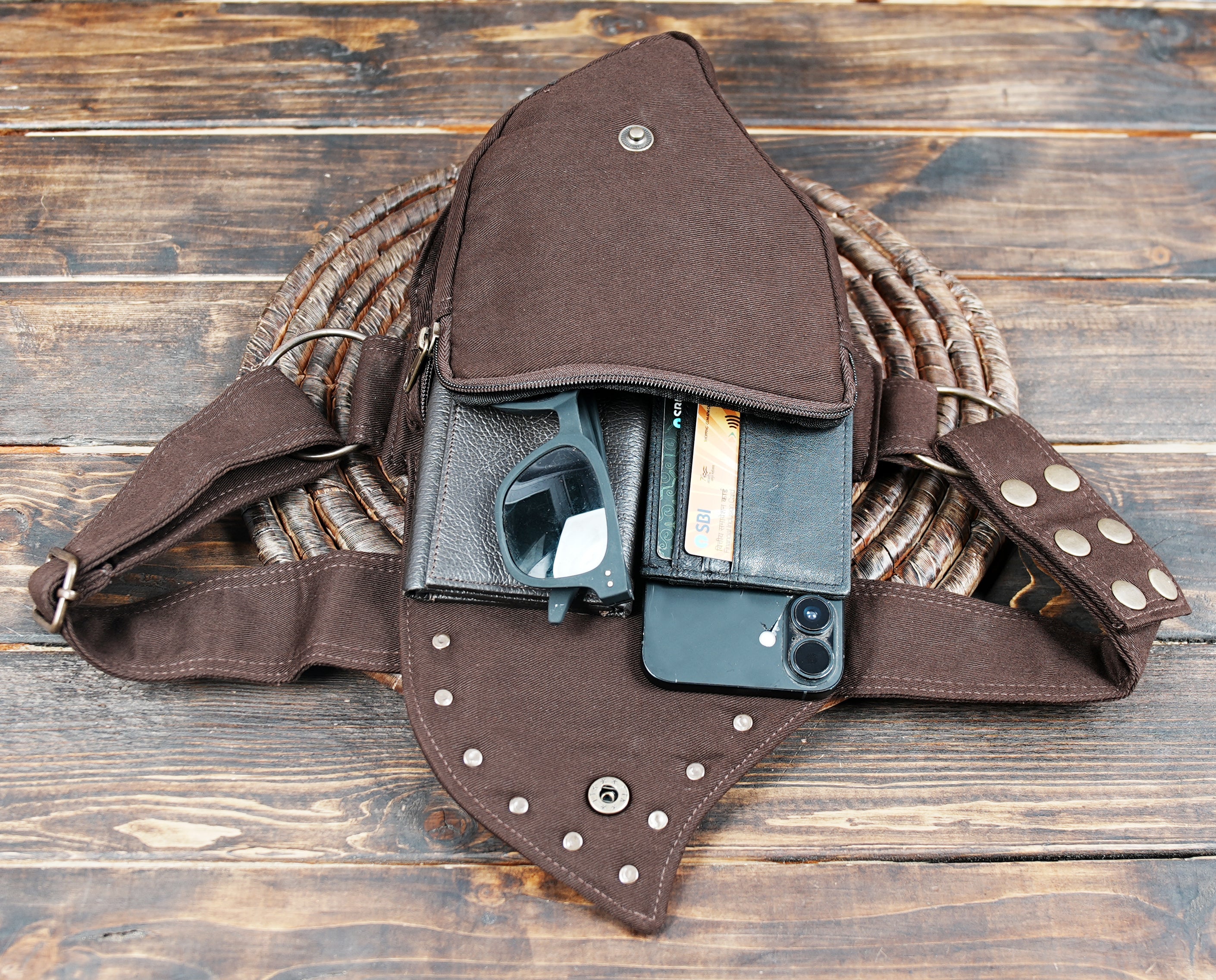 Lace and rivet detail on brown steampunk festival bag