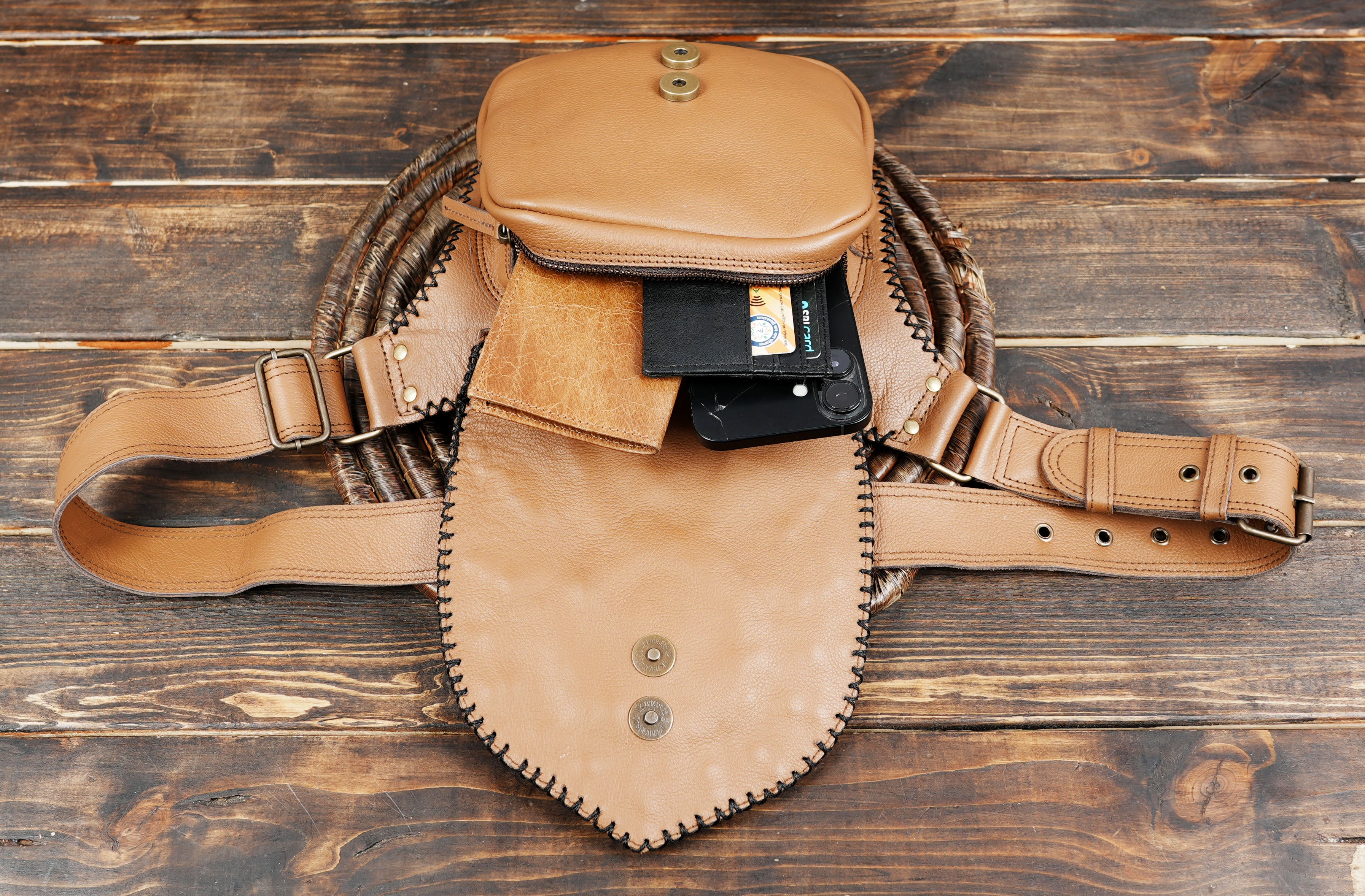 Designer tan leather fanny pack with artistic gemstone embellishment