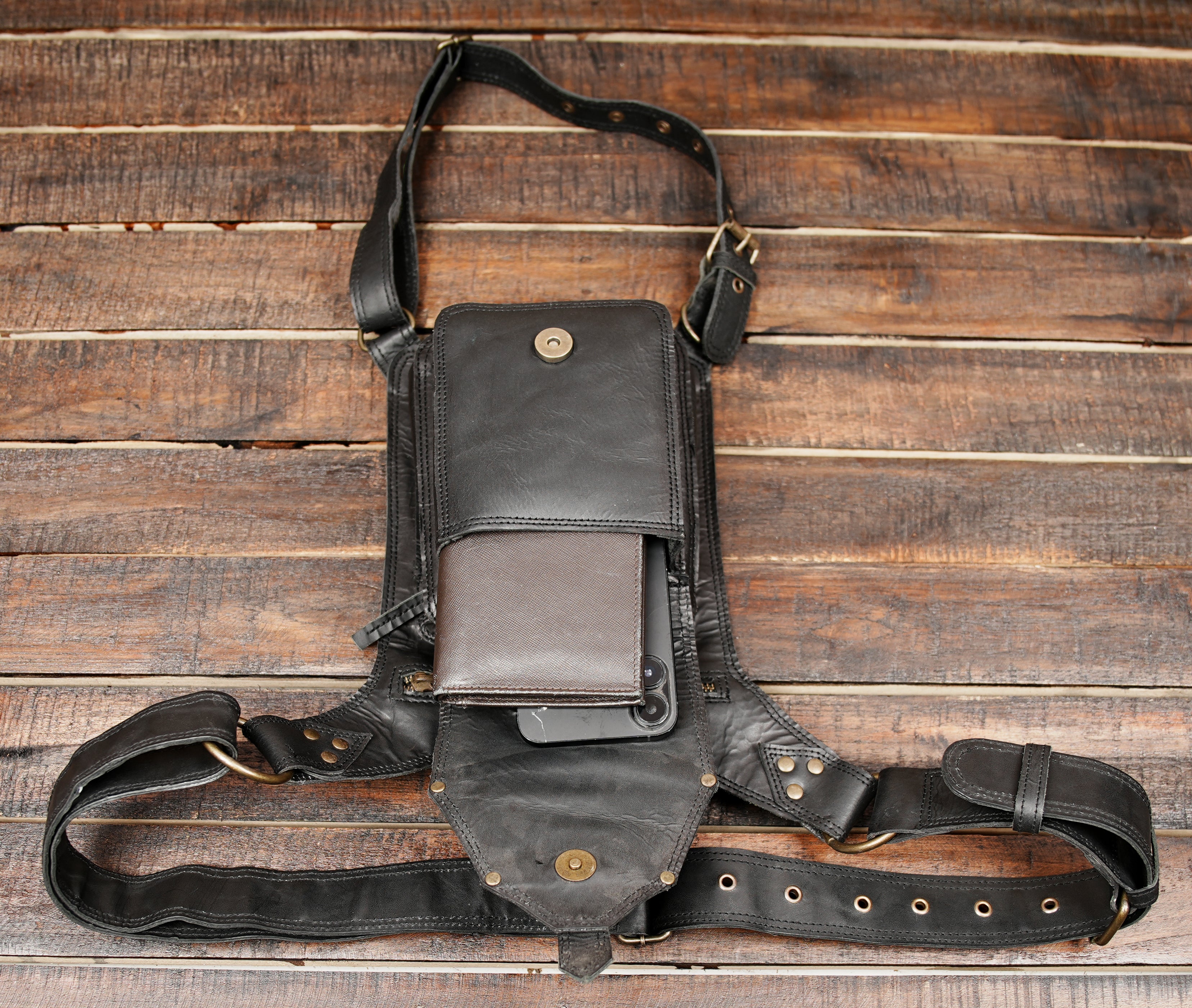 This Handmade Black Leather Waist & Thigh Belt is crafted for those who love bold and functional fashion.
