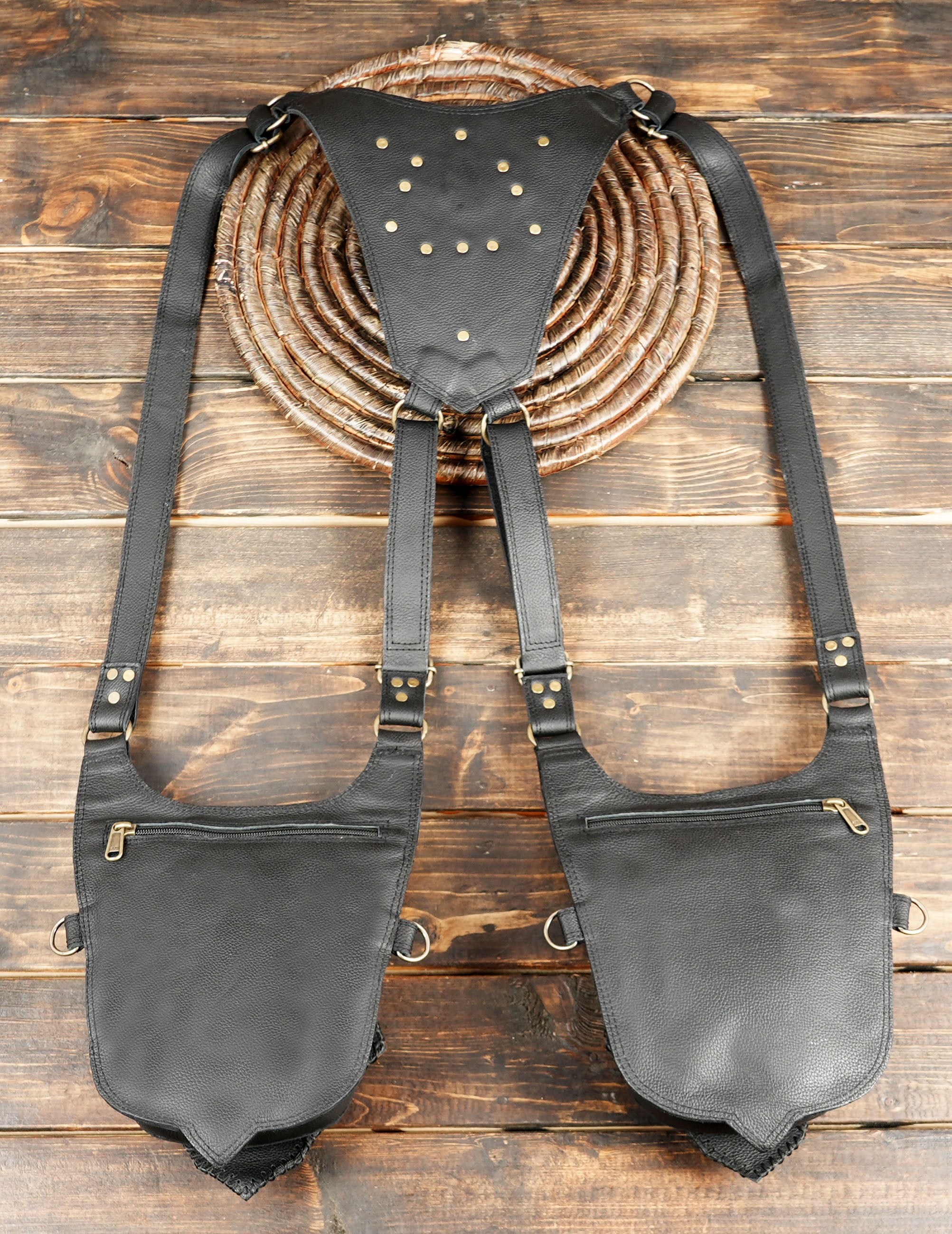 Brown and black handcrafted leather pouch for festival and streetwear fashion.