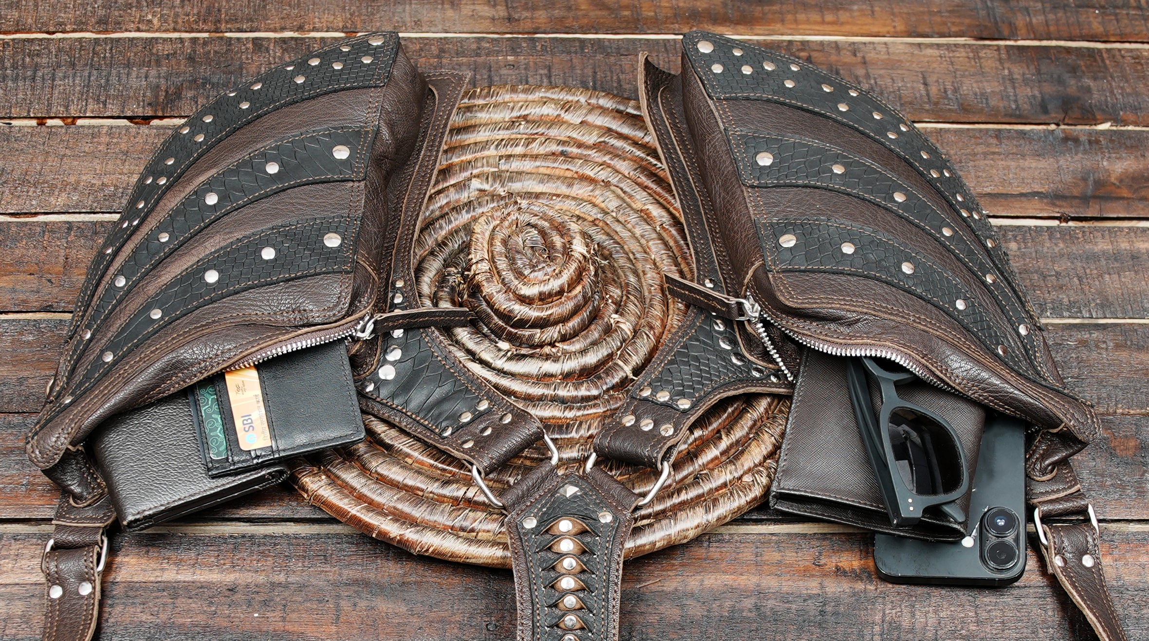 The holster offers dual side compartments to carry your essentials securely while keeping your hands free.