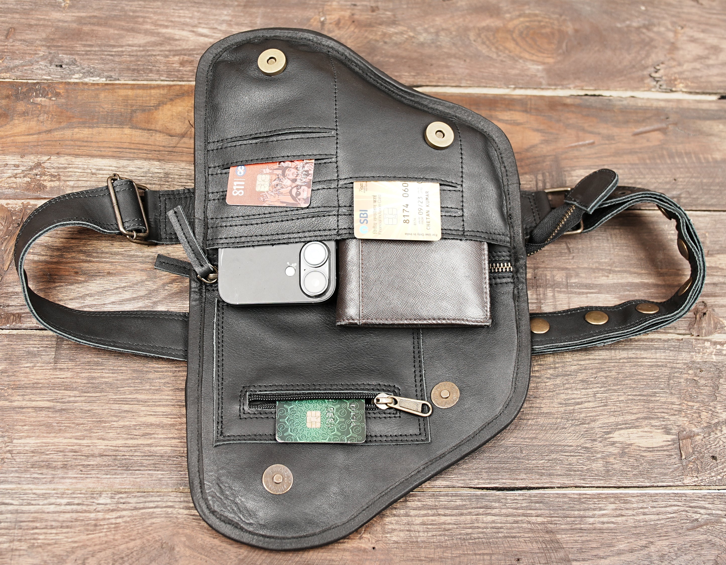 Brown leather gemstone hip bag worn by female model