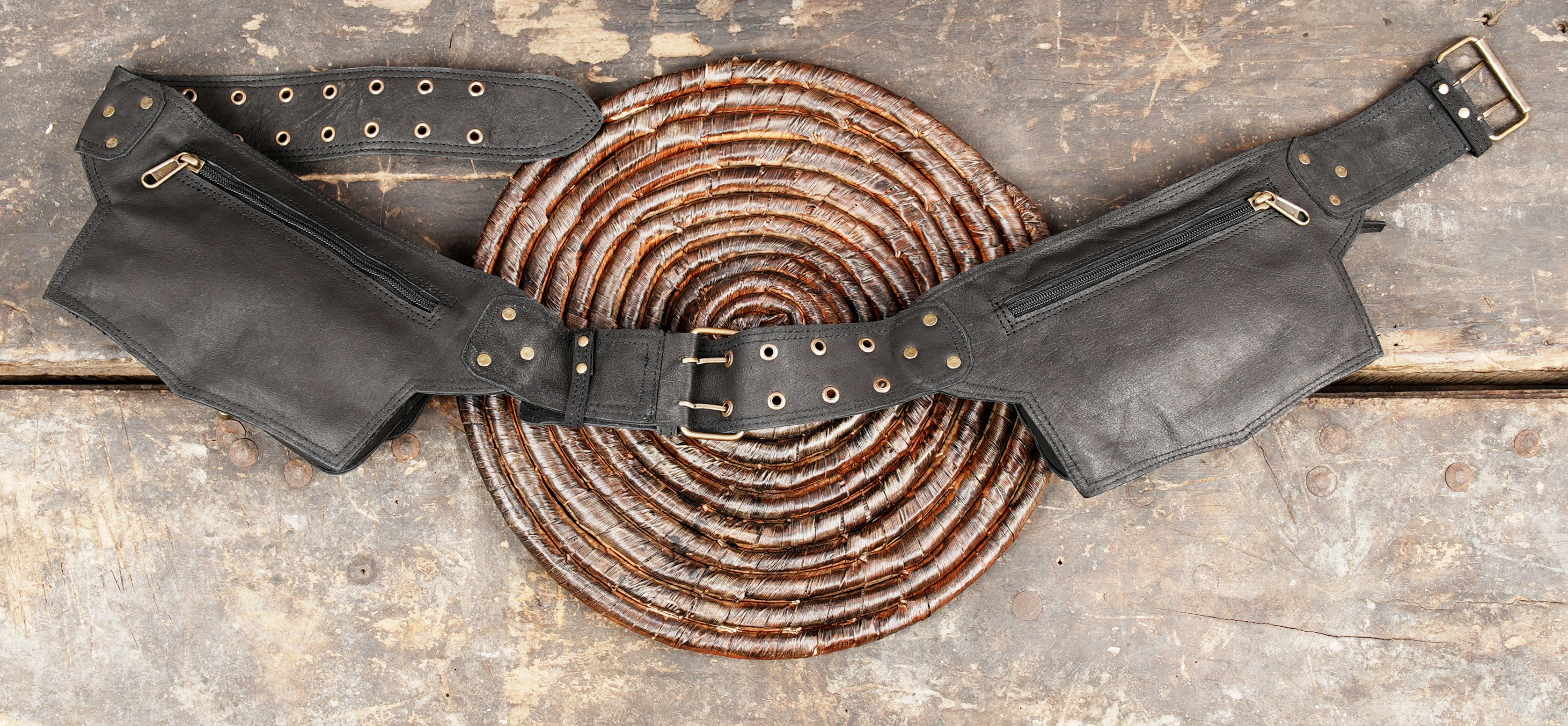 Artisan crafted leather waist belt with dual bags