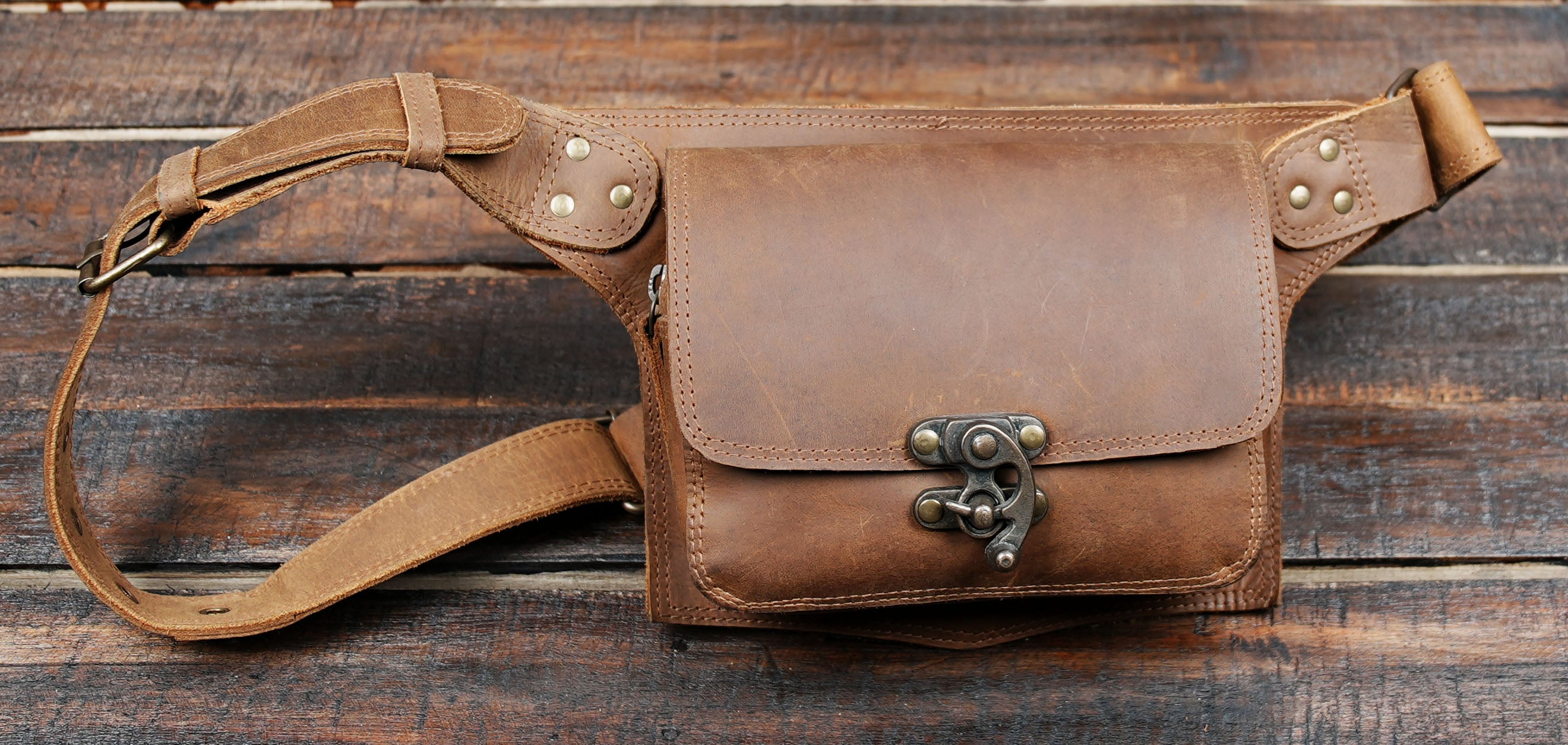 Ideal for festivals, cosplay, steampunk fashion, Burning Man events, hiking, travel, or everyday wear, this leather belt bag combines durability with a unique handcrafted charm.