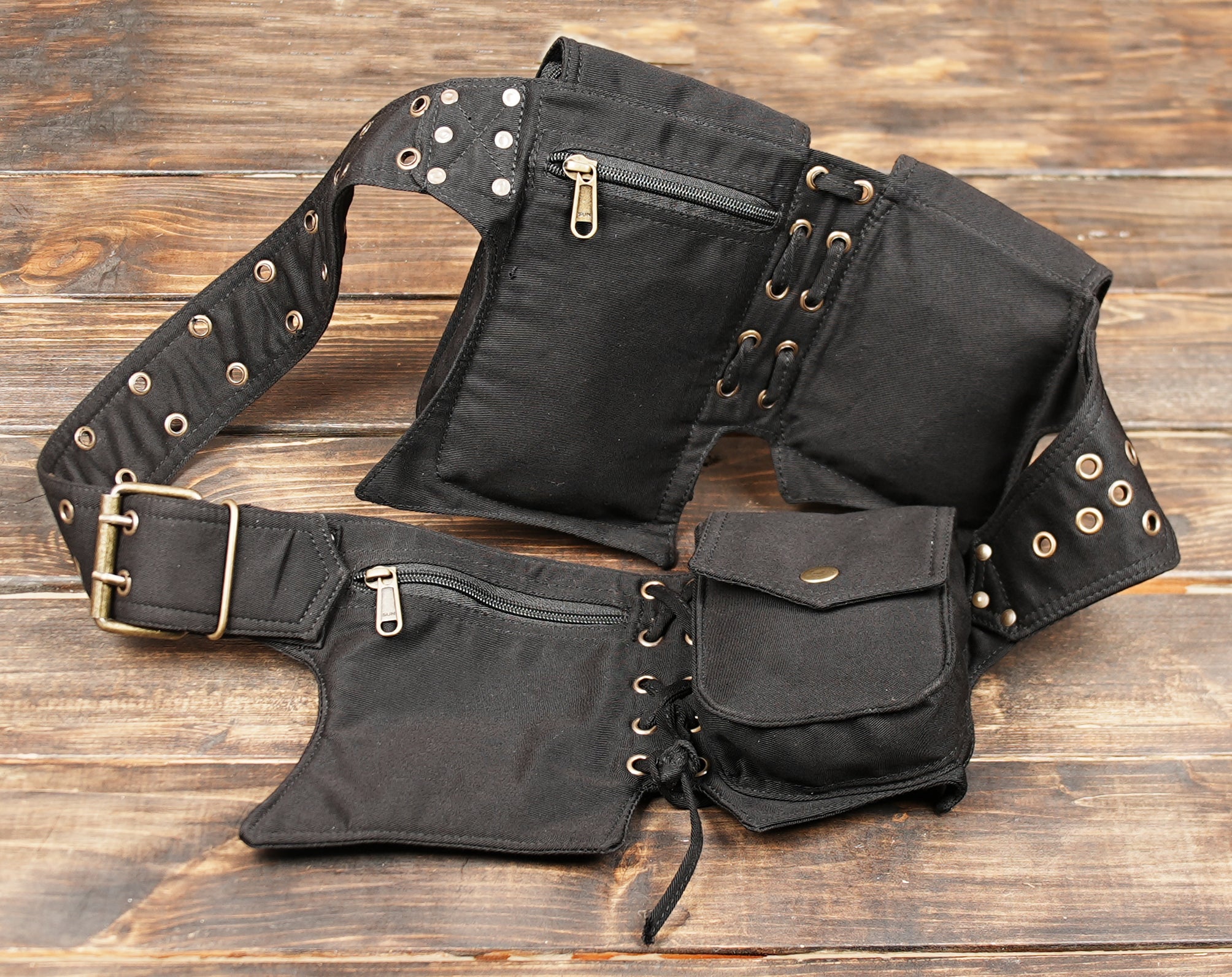 Handmade black leather thigh bag with adjustable buckle strap