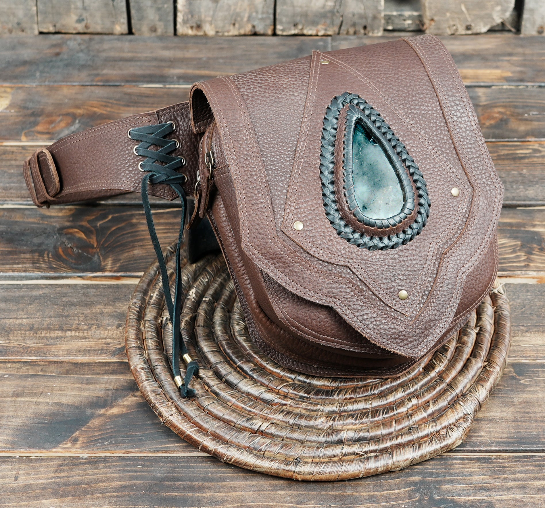 Steampunk style brown leather utility pouch with adjustable belt and metal hardware
