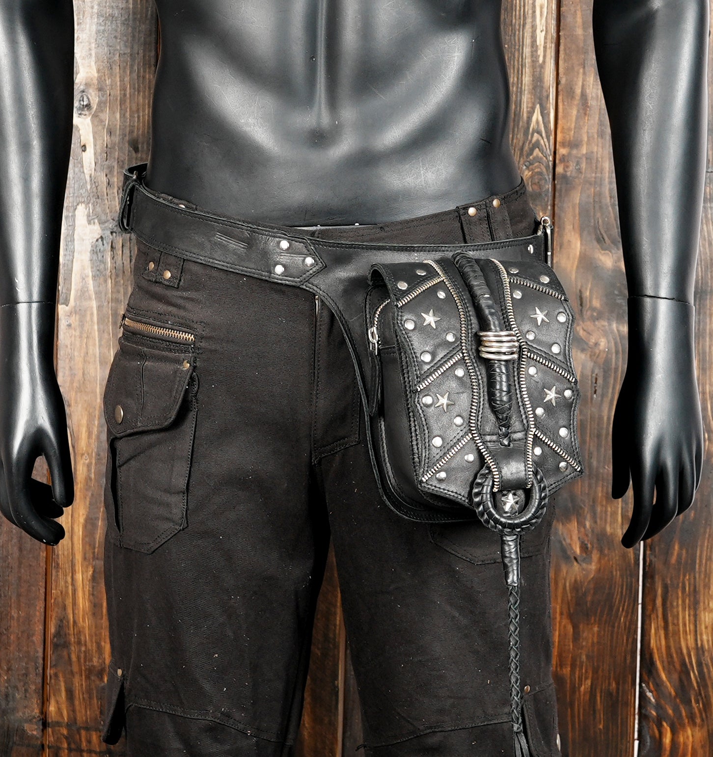 Steampunk-inspired leather belt bag with metal studs