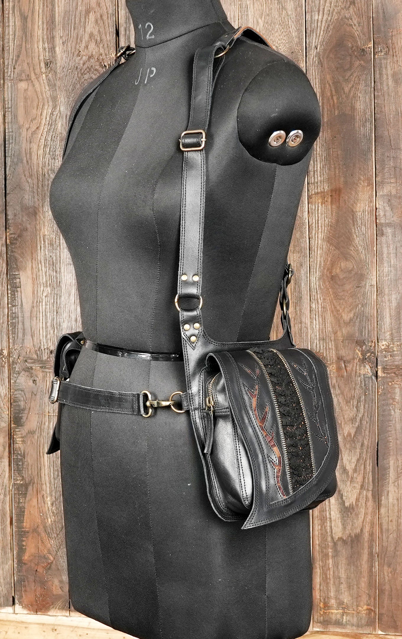 this leather holster is not only a functional utility bag but also a bold fashion statement piece