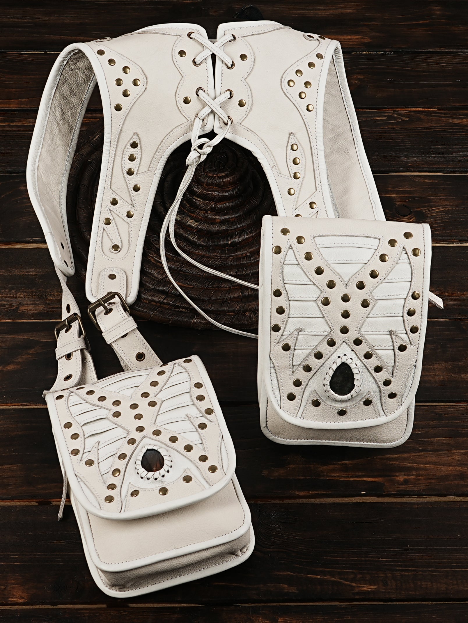 Back view of adjustable leather crossbody harness bag