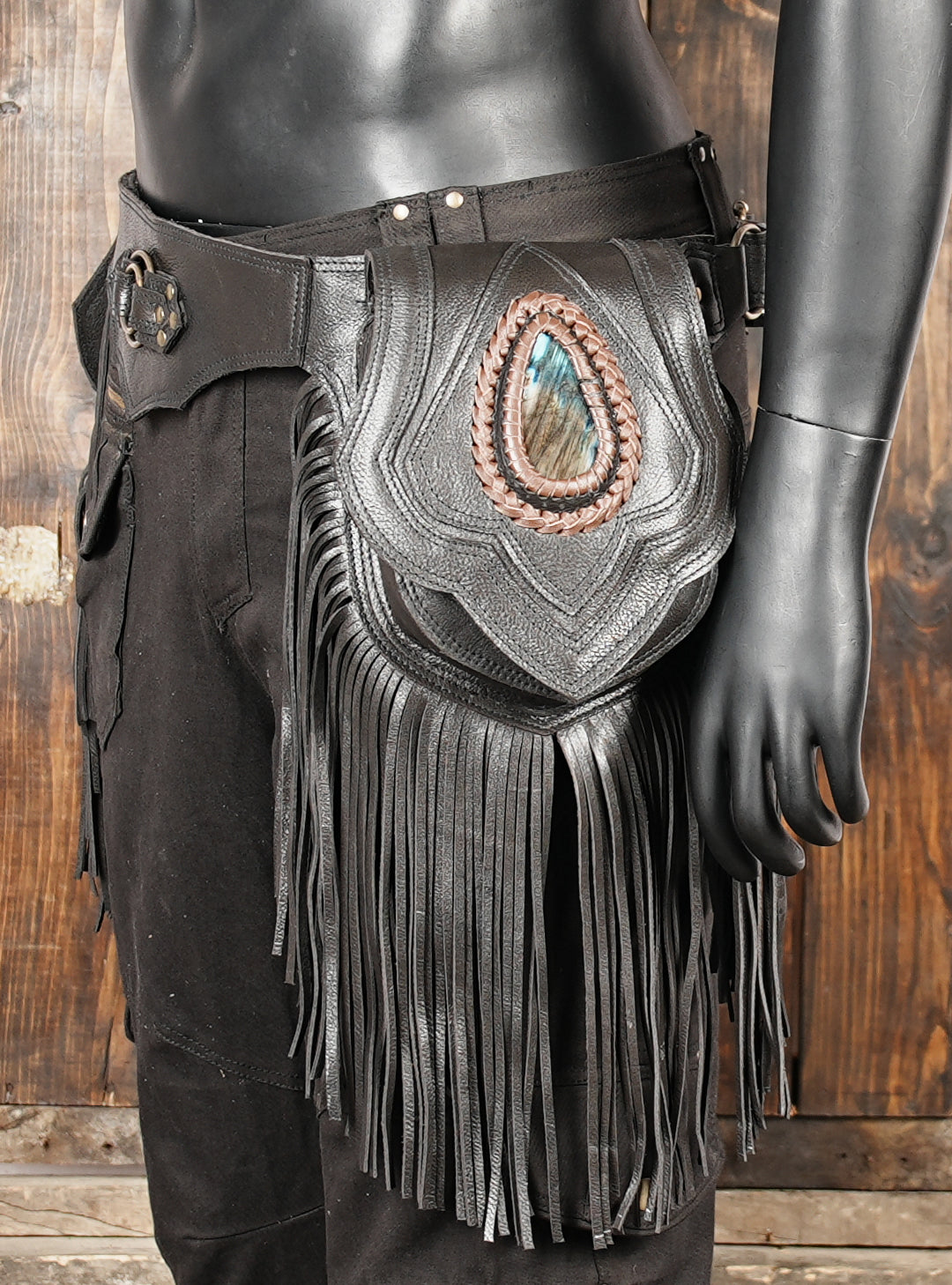 Stylish black leather waist bag with brown trim